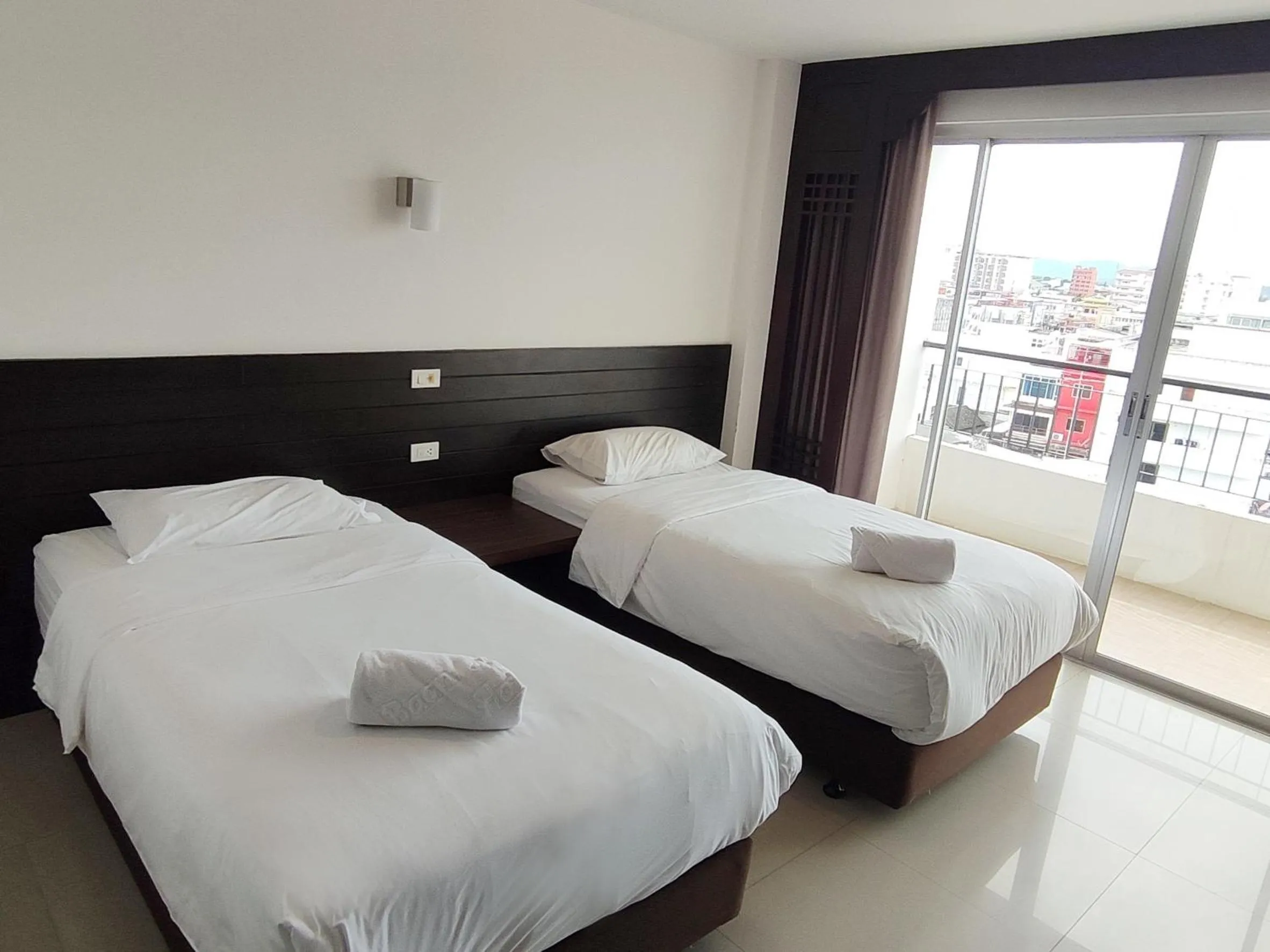 Bed in Baan Manthana Hotel, Hua Hin