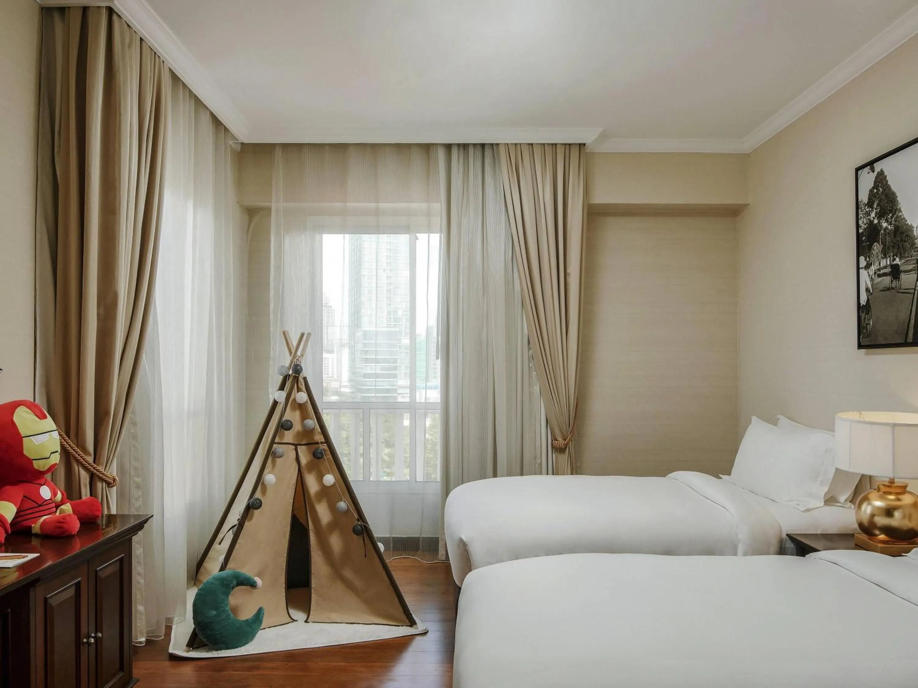 Photo of the whole room, Bed in Sofitel Phnom Penh Phokeethra