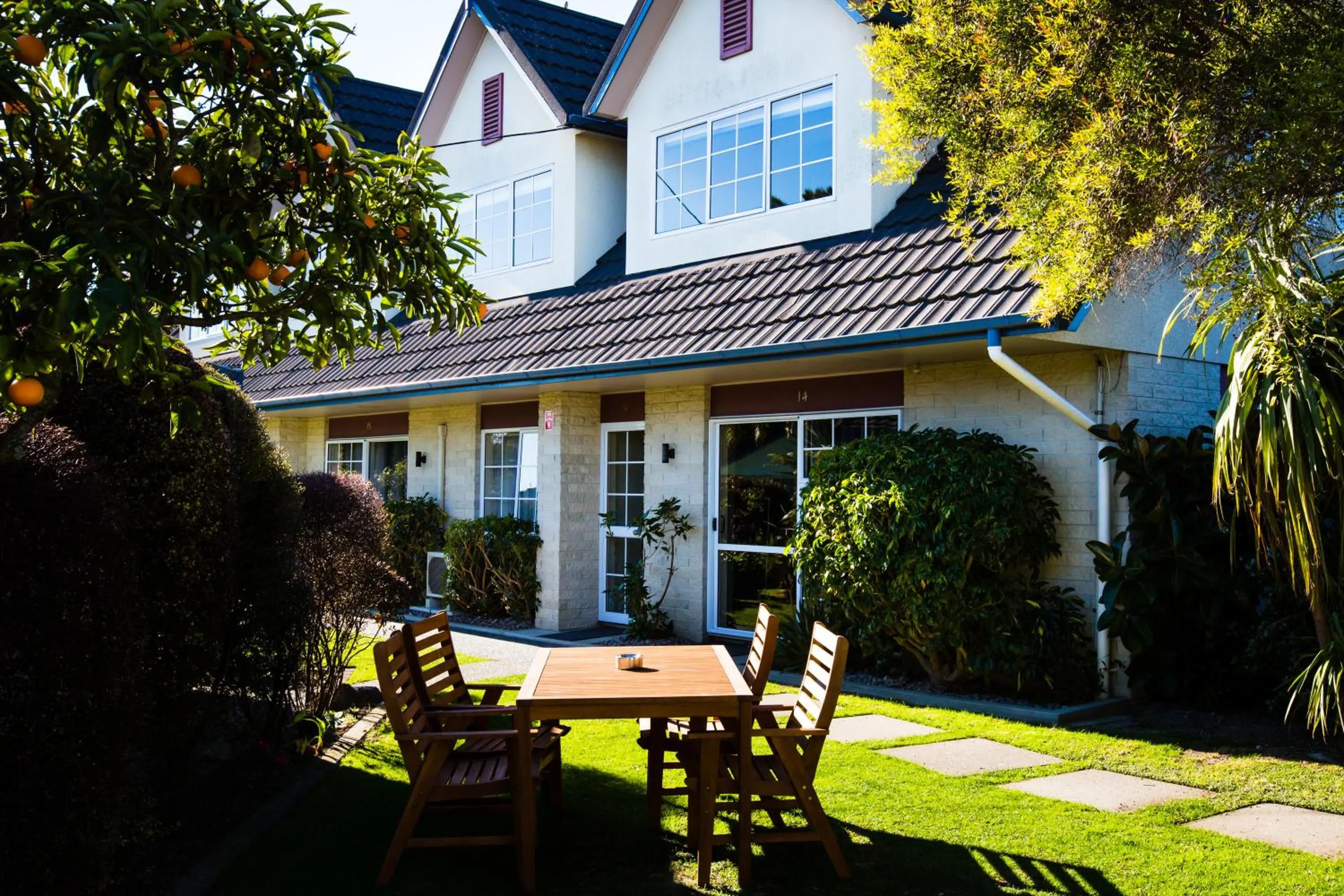 Garden in ASURE Colonial Lodge Motel