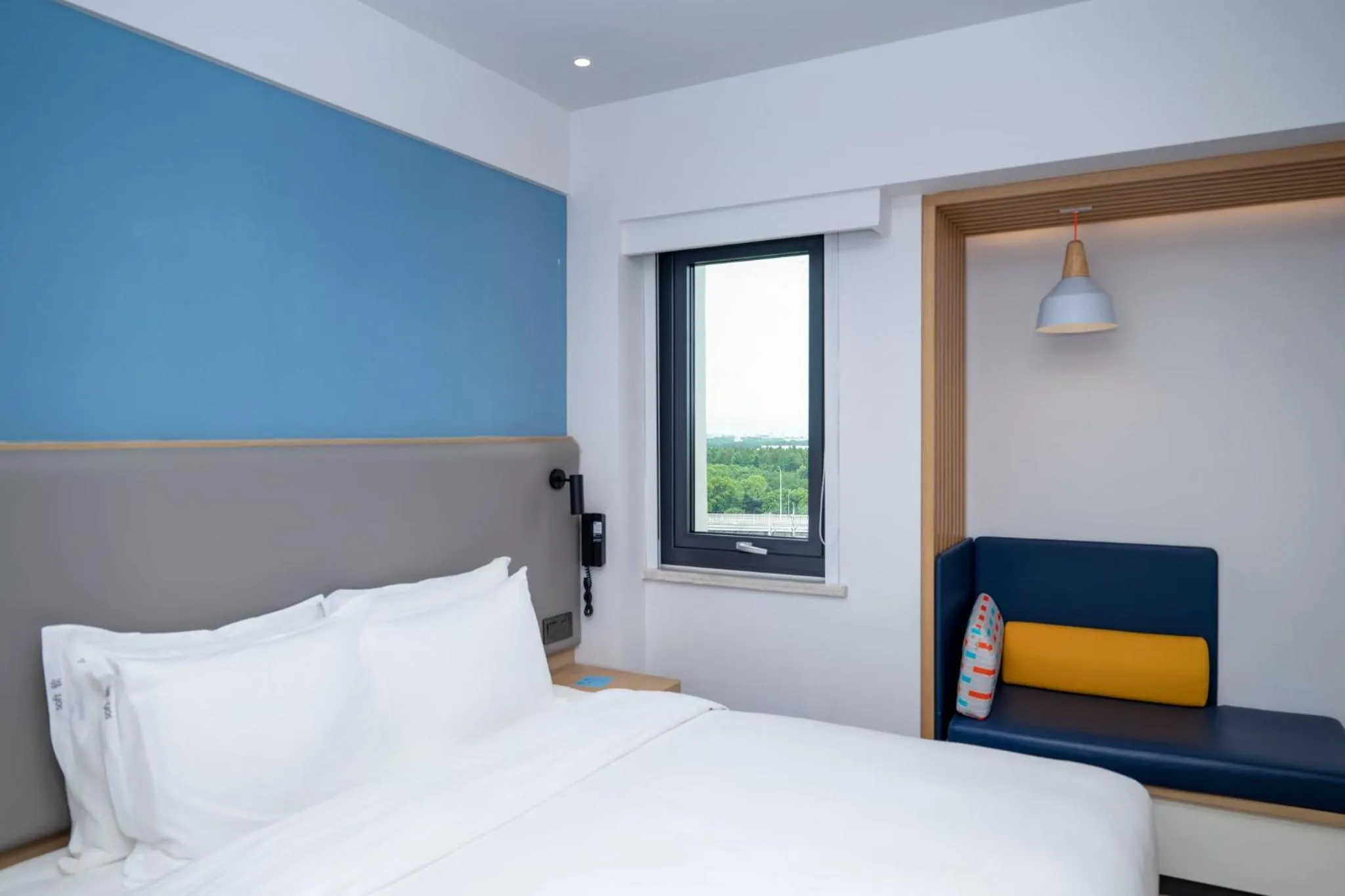 Photo of the whole room, Bed in Holiday Inn Express Shanghai Pudong Airport by IHG