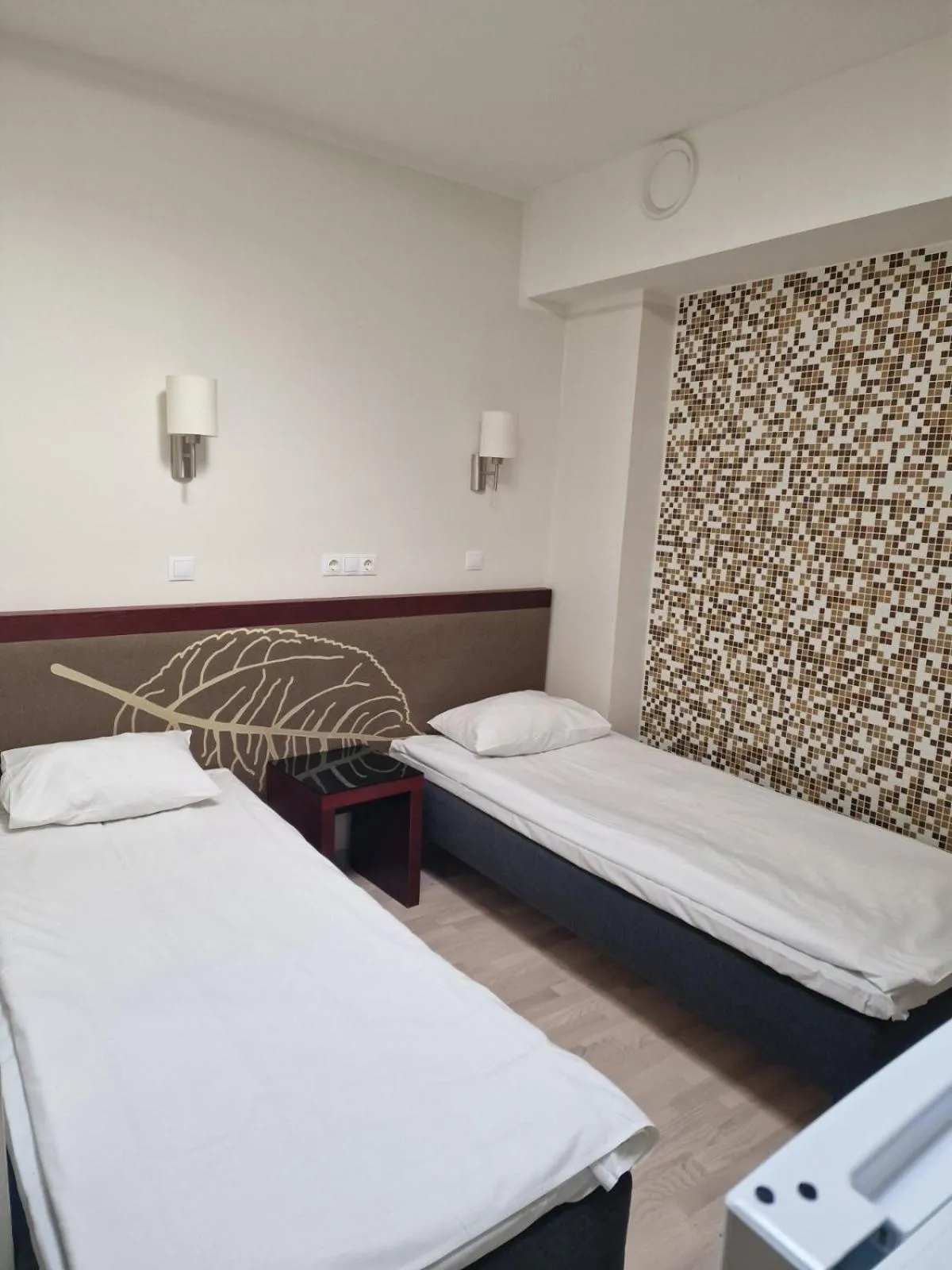 Bed in Ecoland Hotel