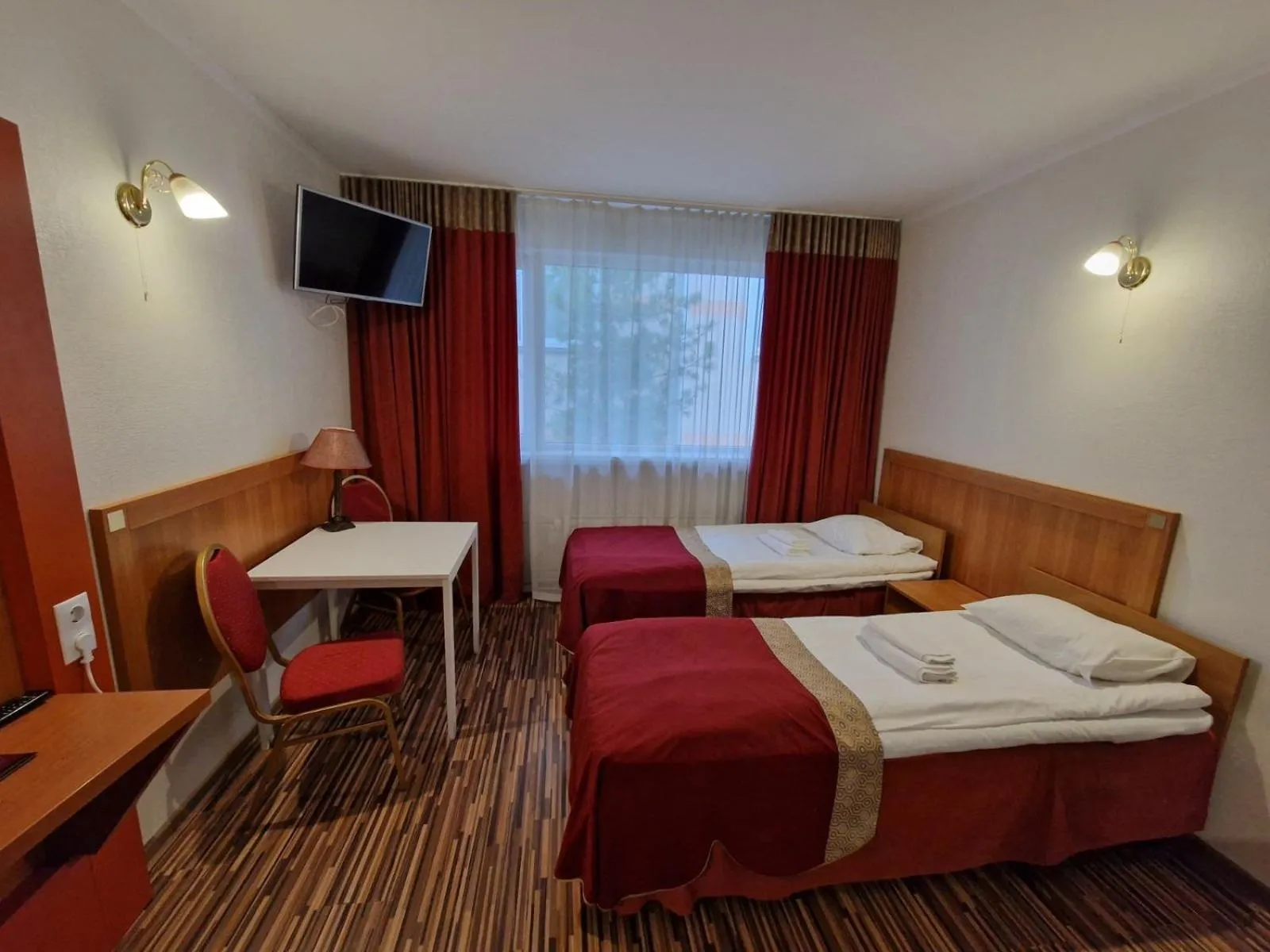 Bed in Ecoland Hotel