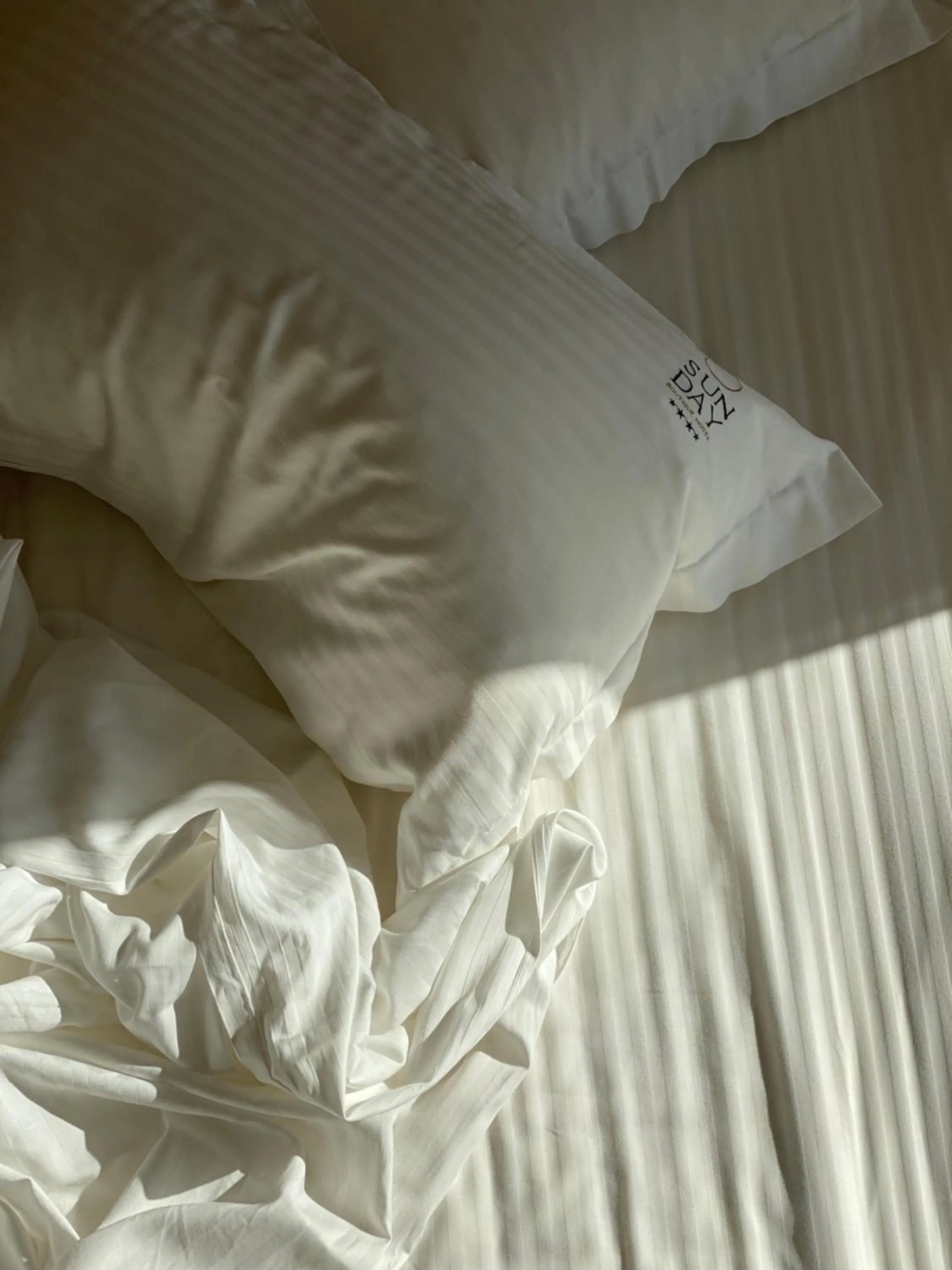 Bed in Sunday Boutique Hotel