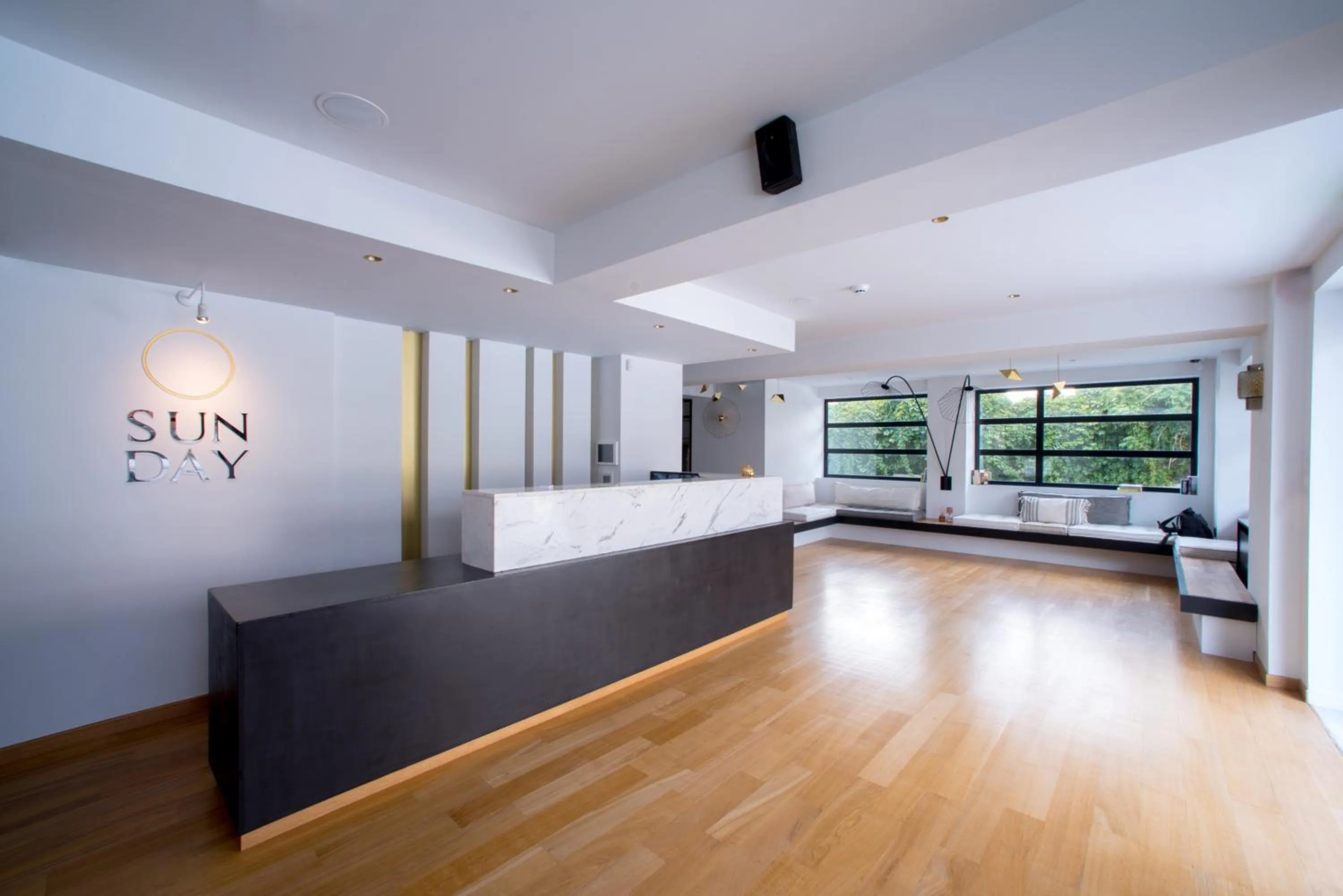 Communal lounge/ TV room in Sunday Boutique Hotel