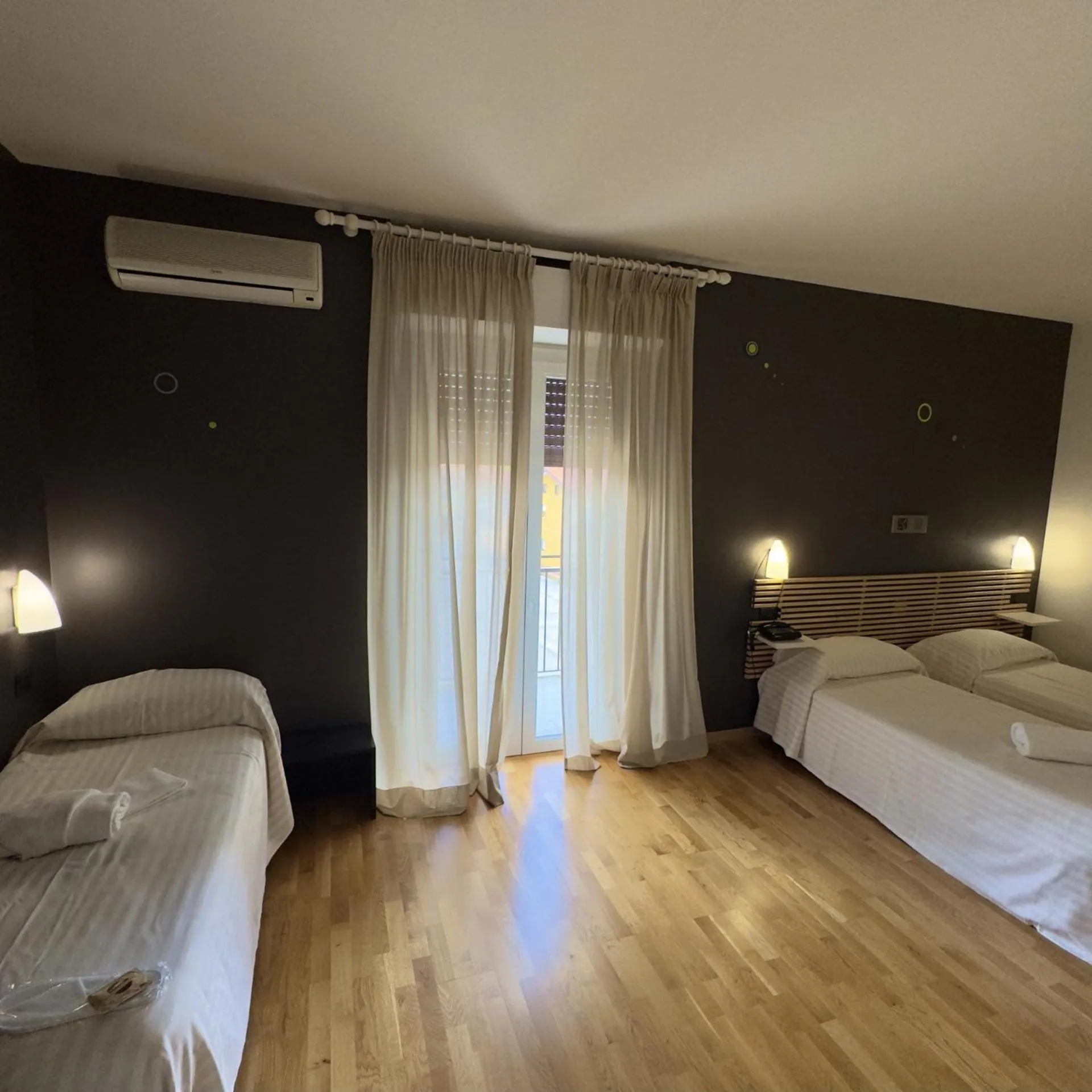 Bed in Hotel Quadrifoglio