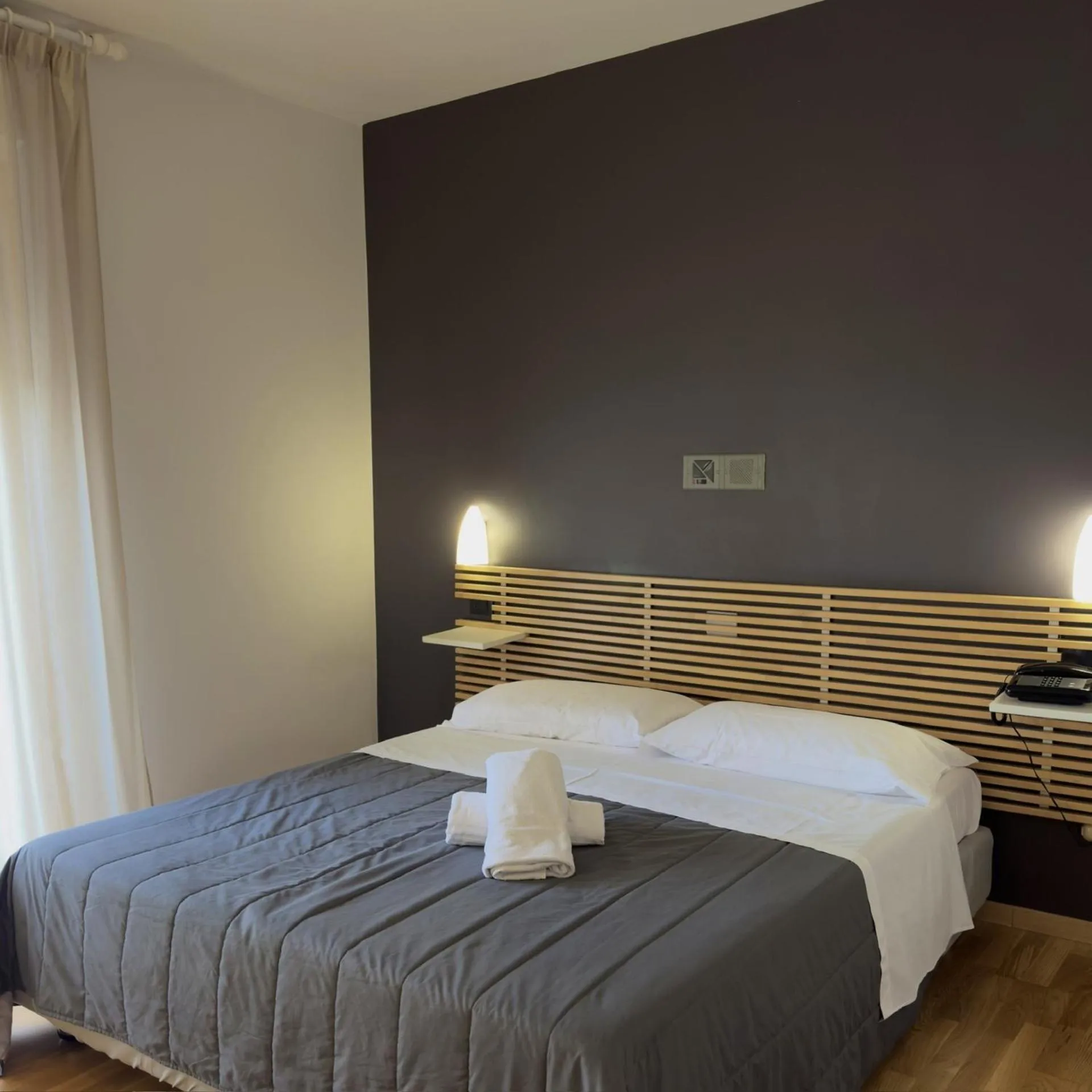 Bed in Hotel Quadrifoglio