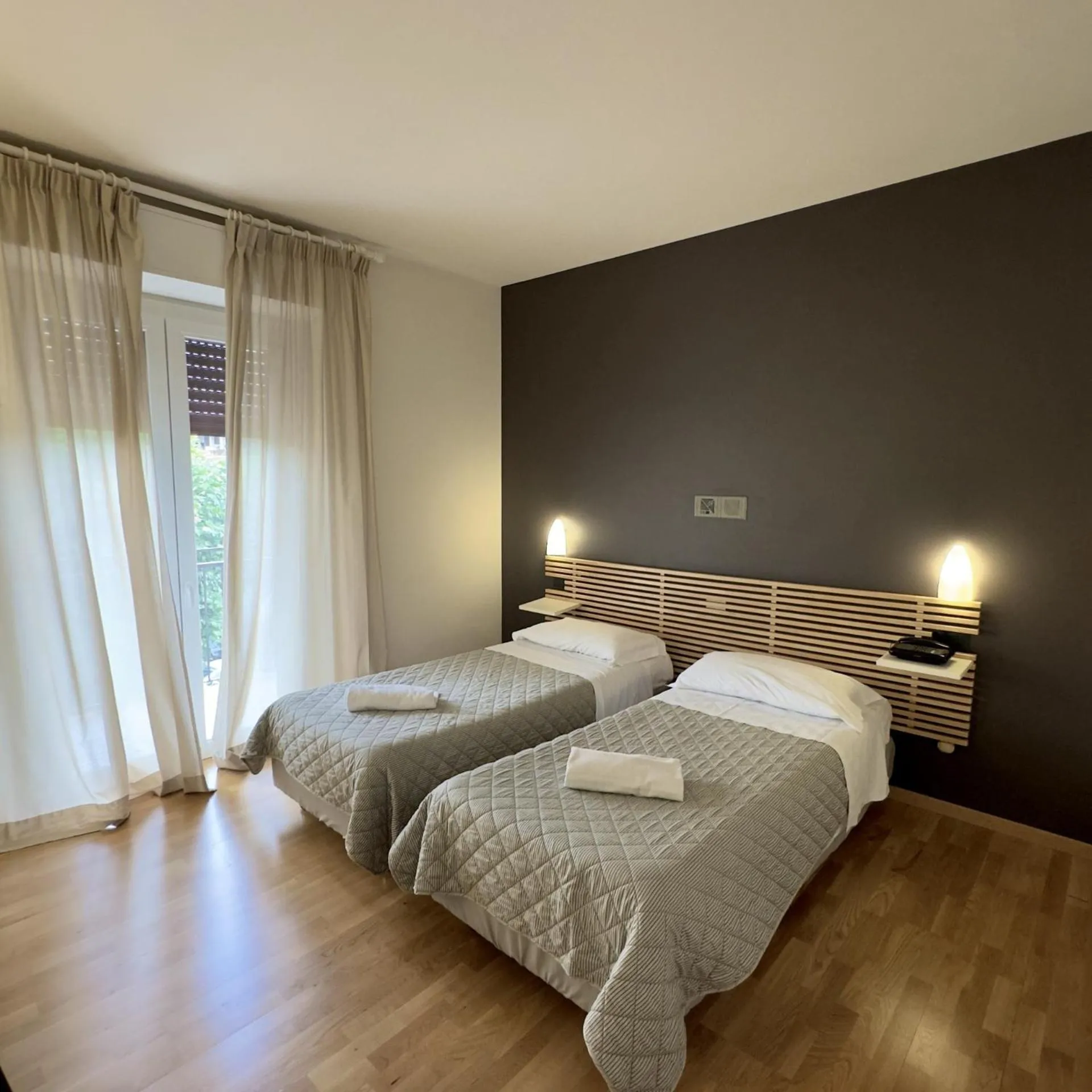 Bed in Hotel Quadrifoglio