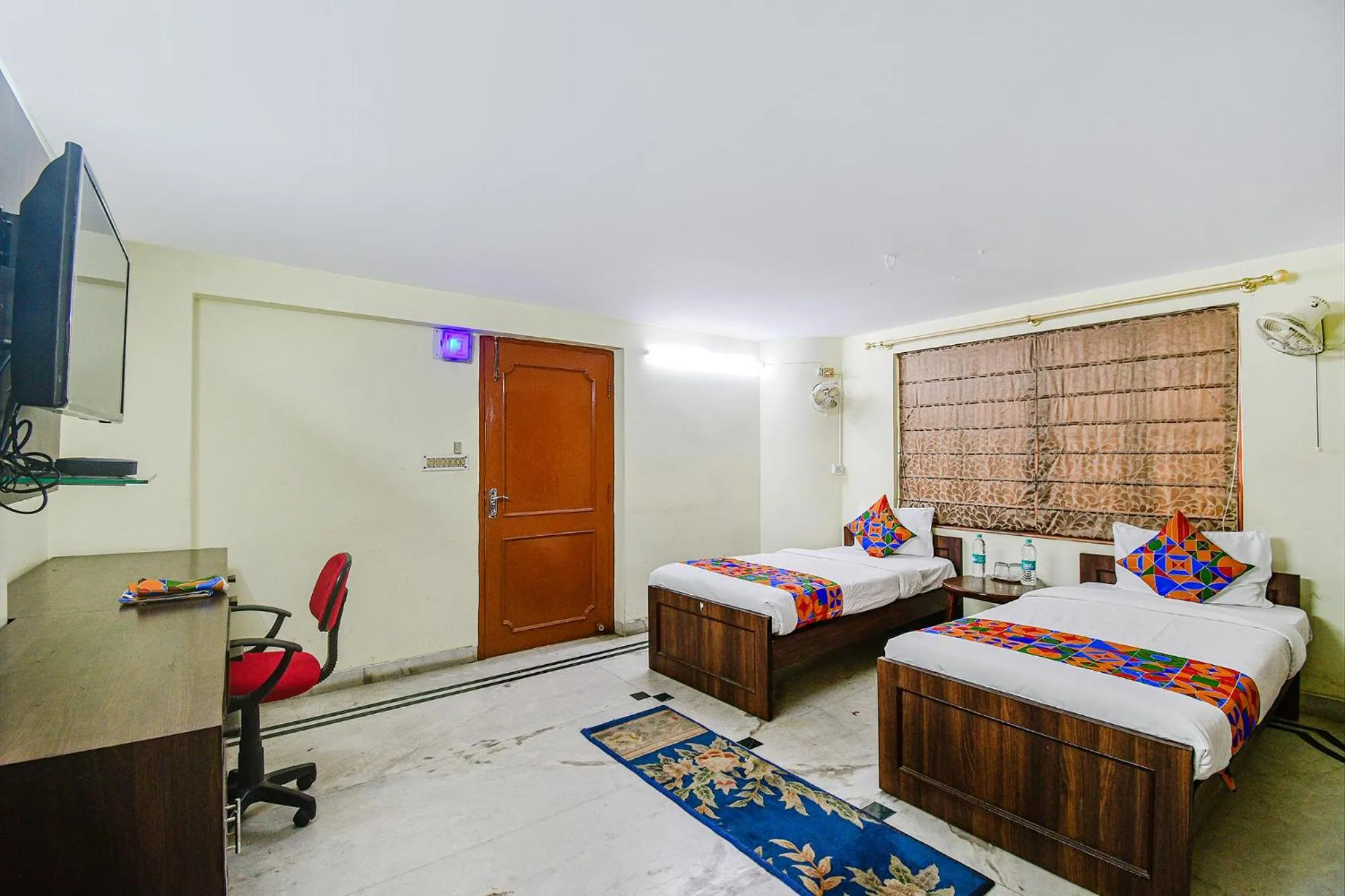 Bed in FabExpress Ullash Residency