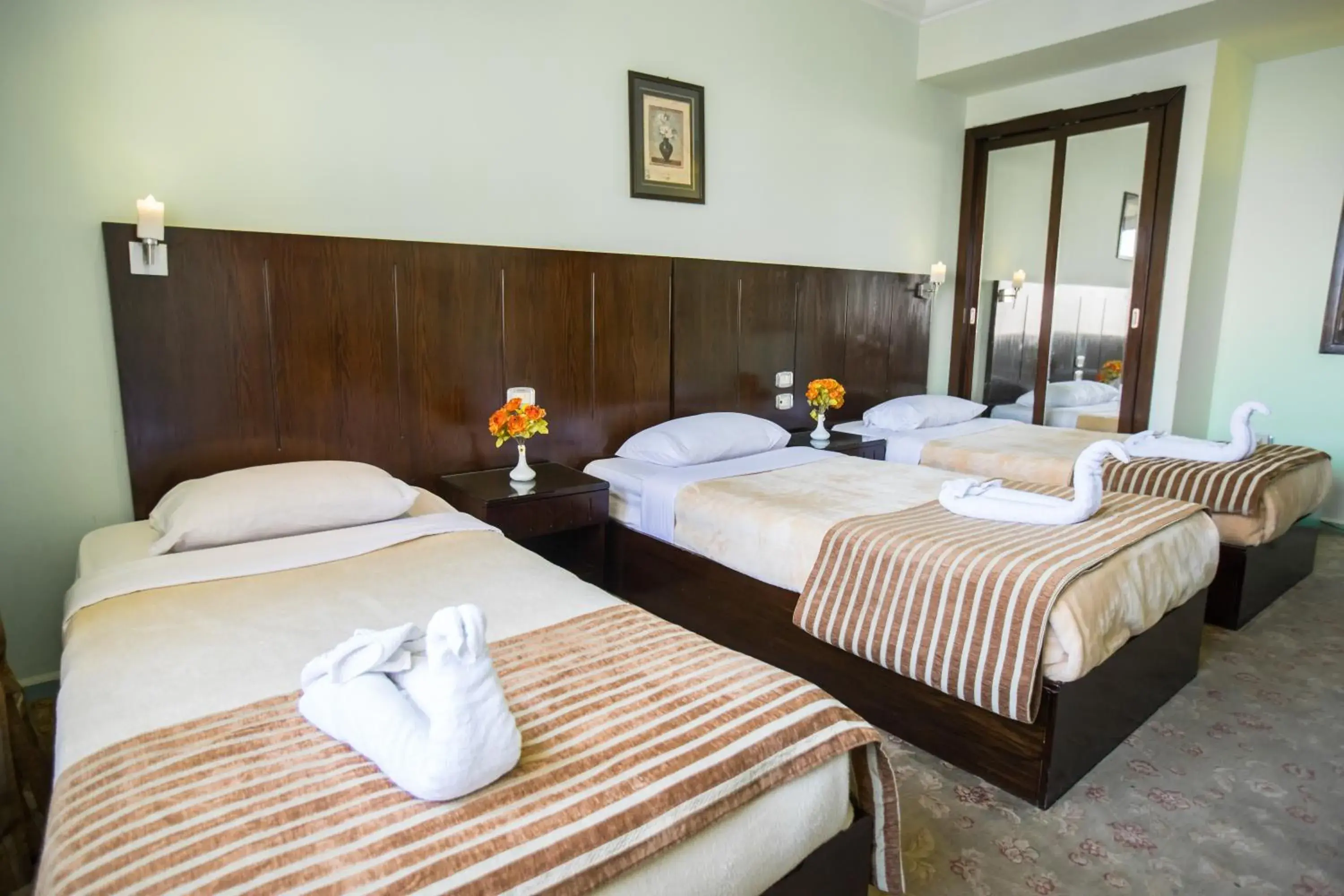 Standard Triple Room in Aura Inn Hotel Cairo Standard Triple Room in Aura Inn Hotel Cairo