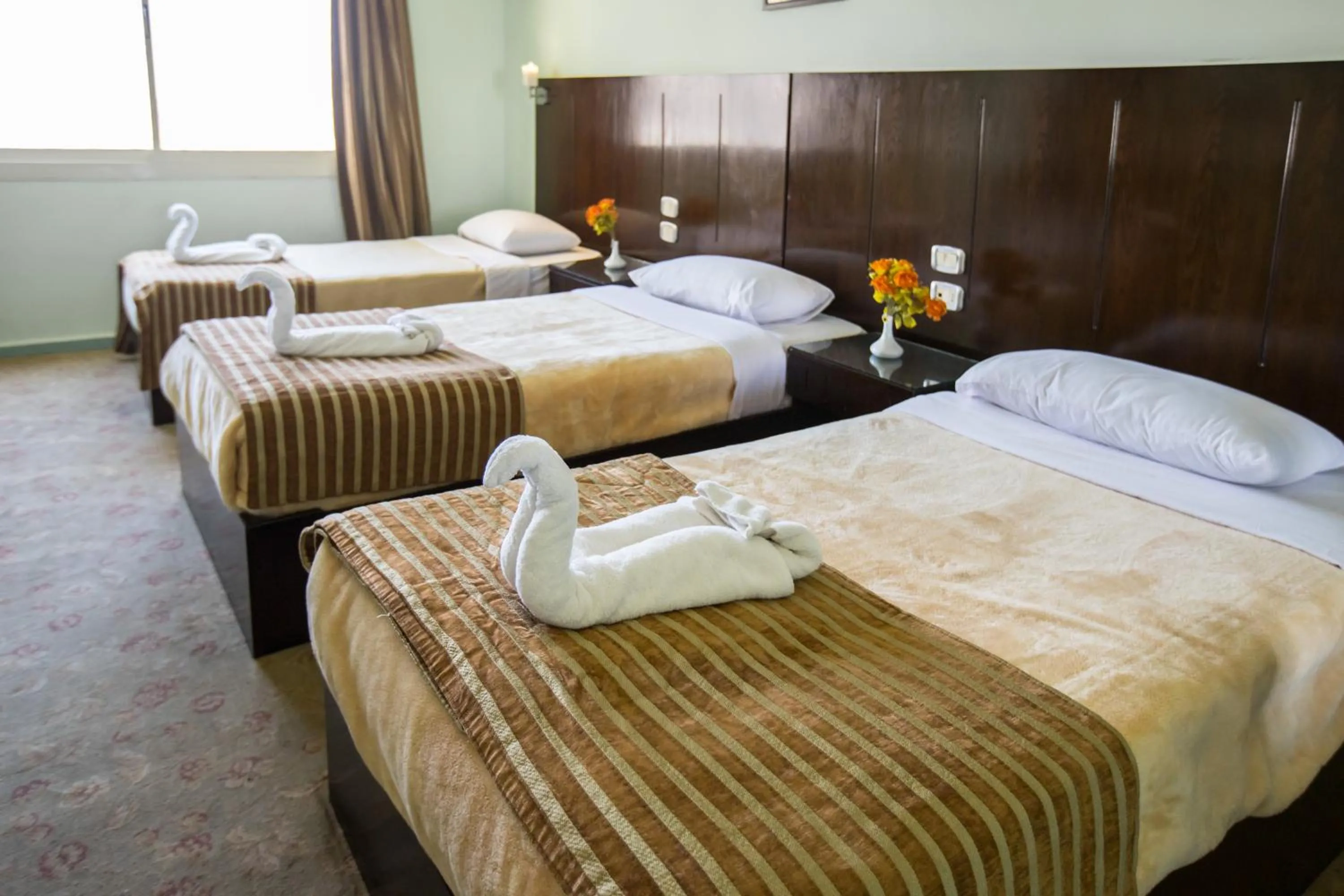 Bed in Aura Inn Hotel Cairo