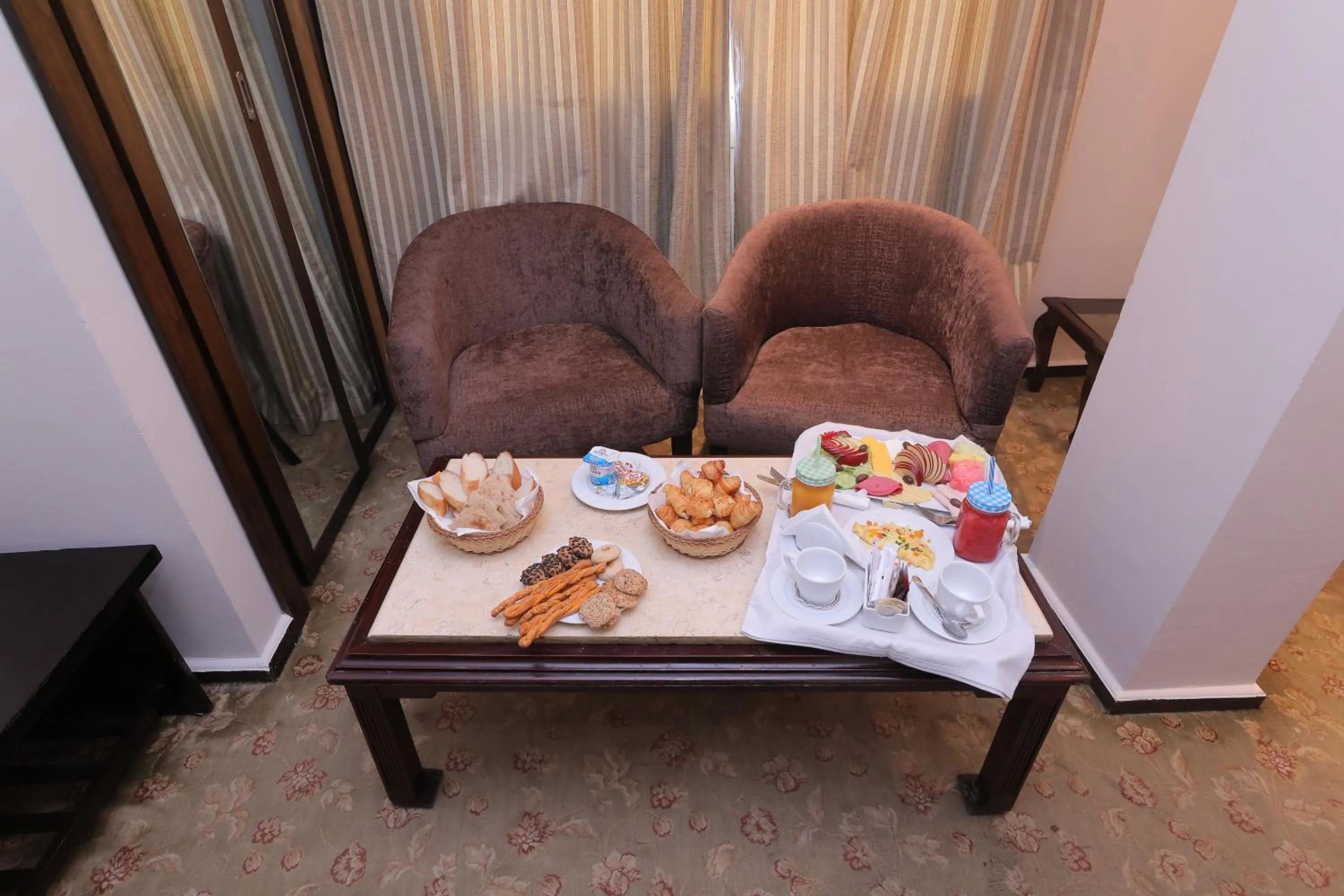 Seating area in Aura Inn Hotel Cairo