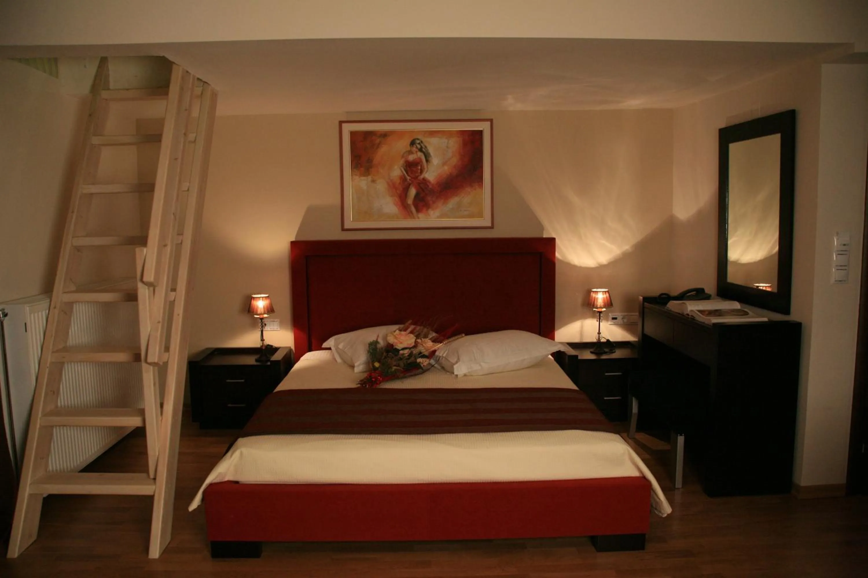 Bed in Epavlis Meteora Suites Hotel