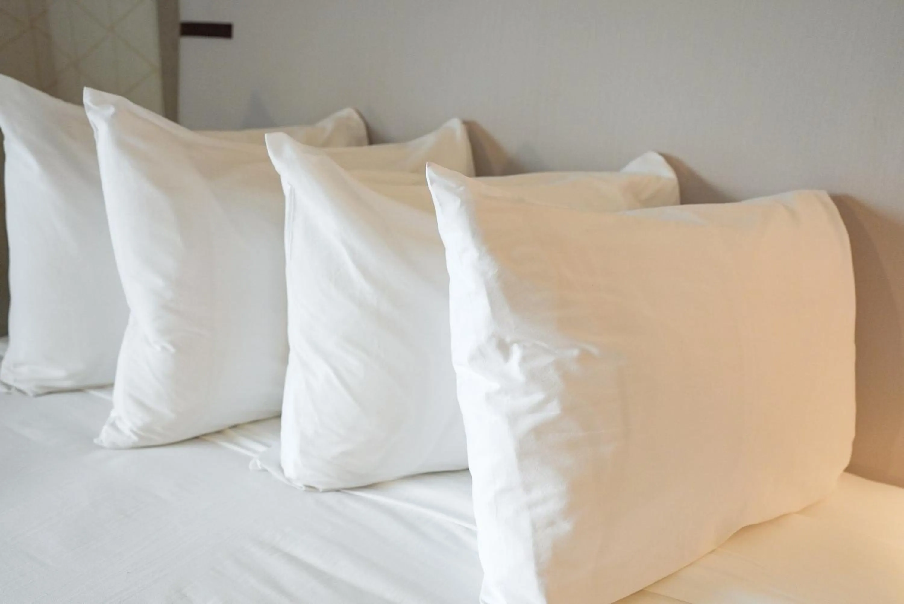 Bed in The Boulevard Hotel