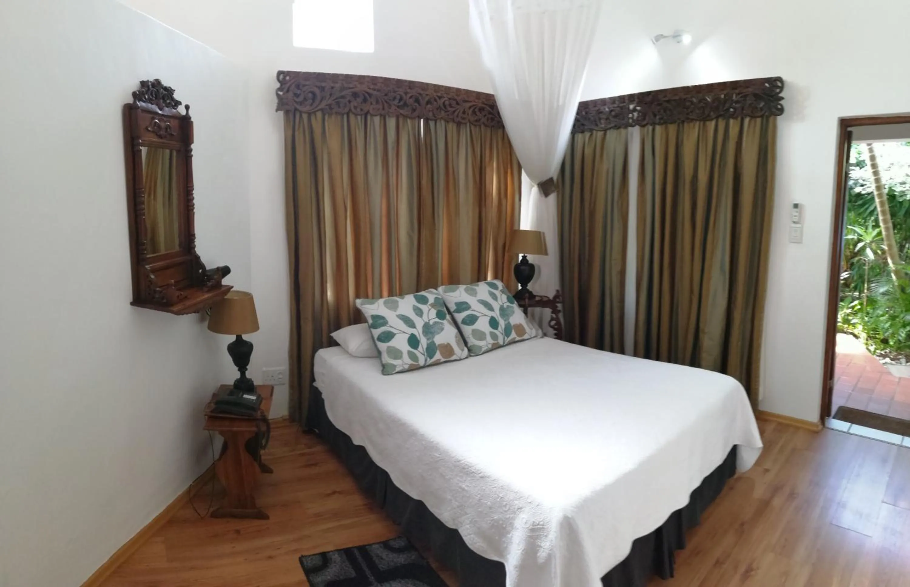 Bed in St. Lucia Wetlands Guest House