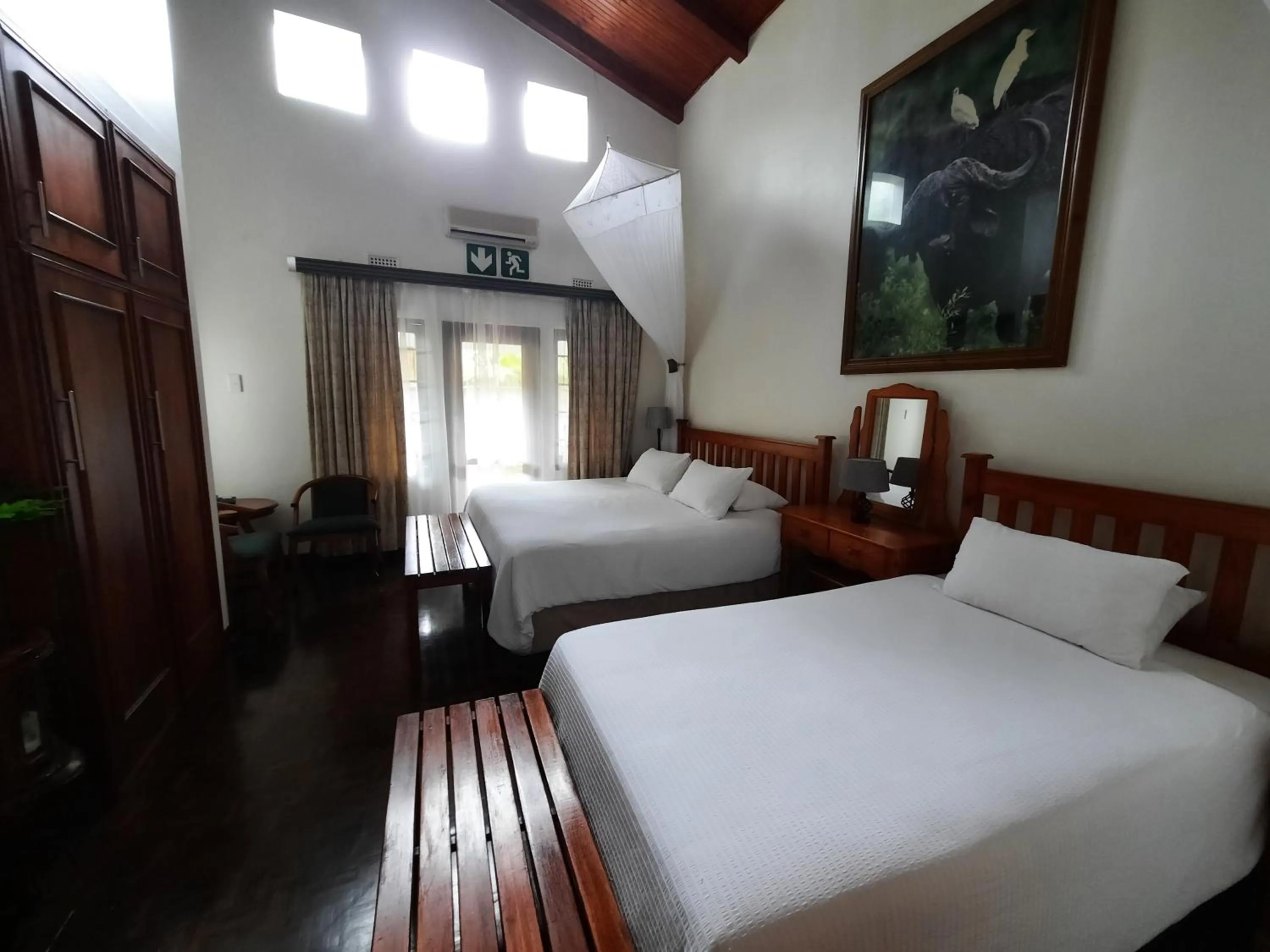 Bed in St. Lucia Wetlands Guest House