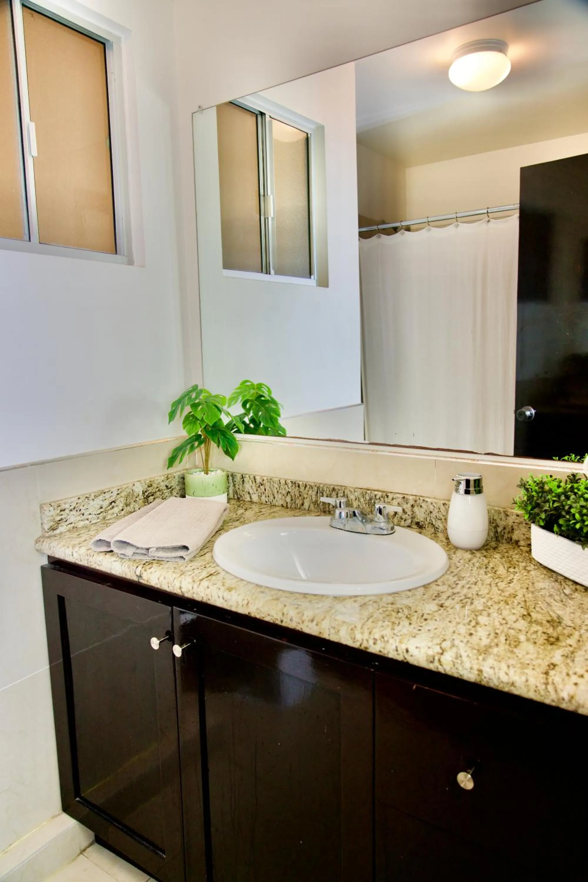 Bathroom in Rio Suites