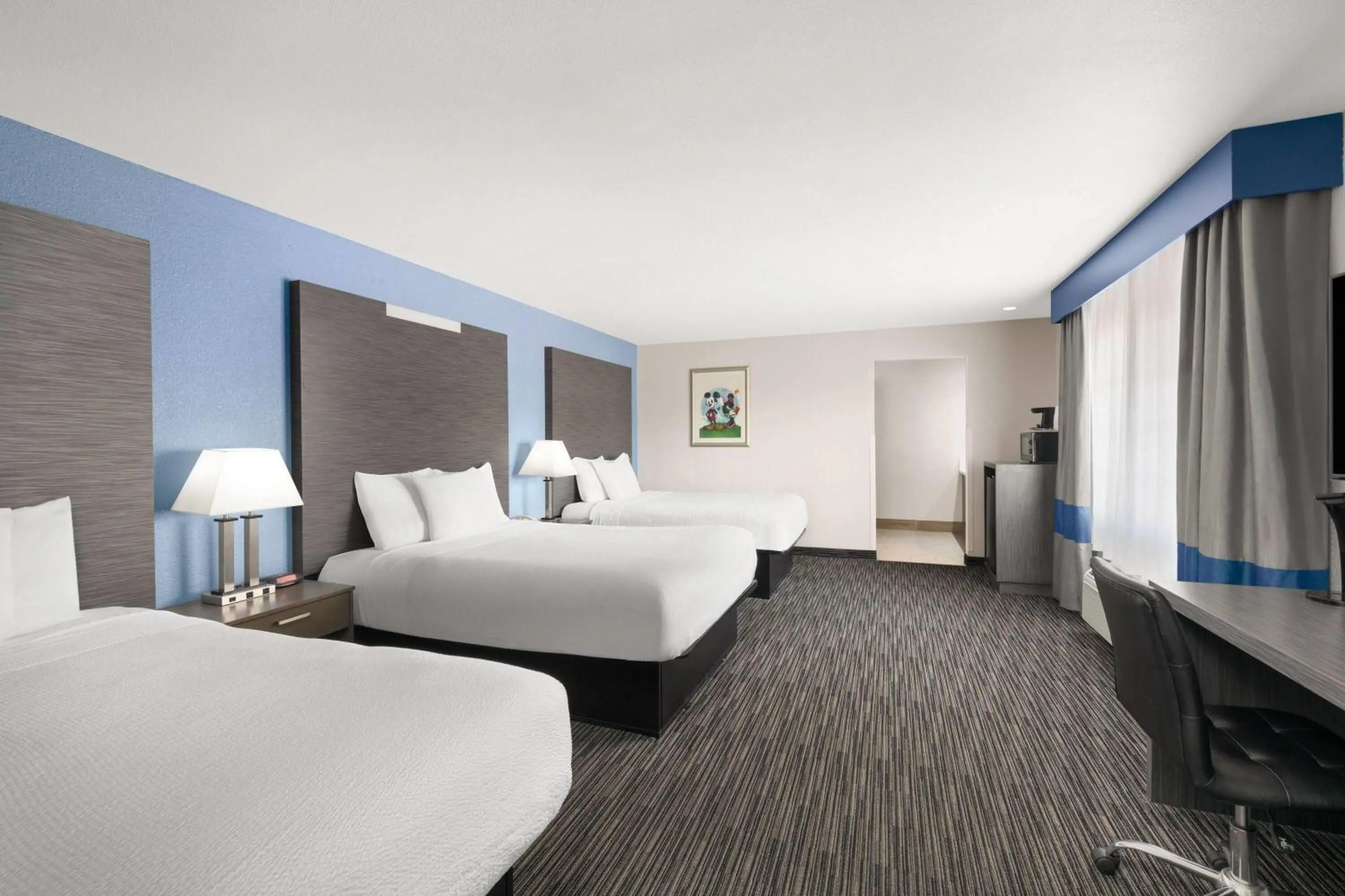 Photo of the whole room, Bed in Travelodge Inn & Suites by Wyndham Anaheim on Disneyland Dr