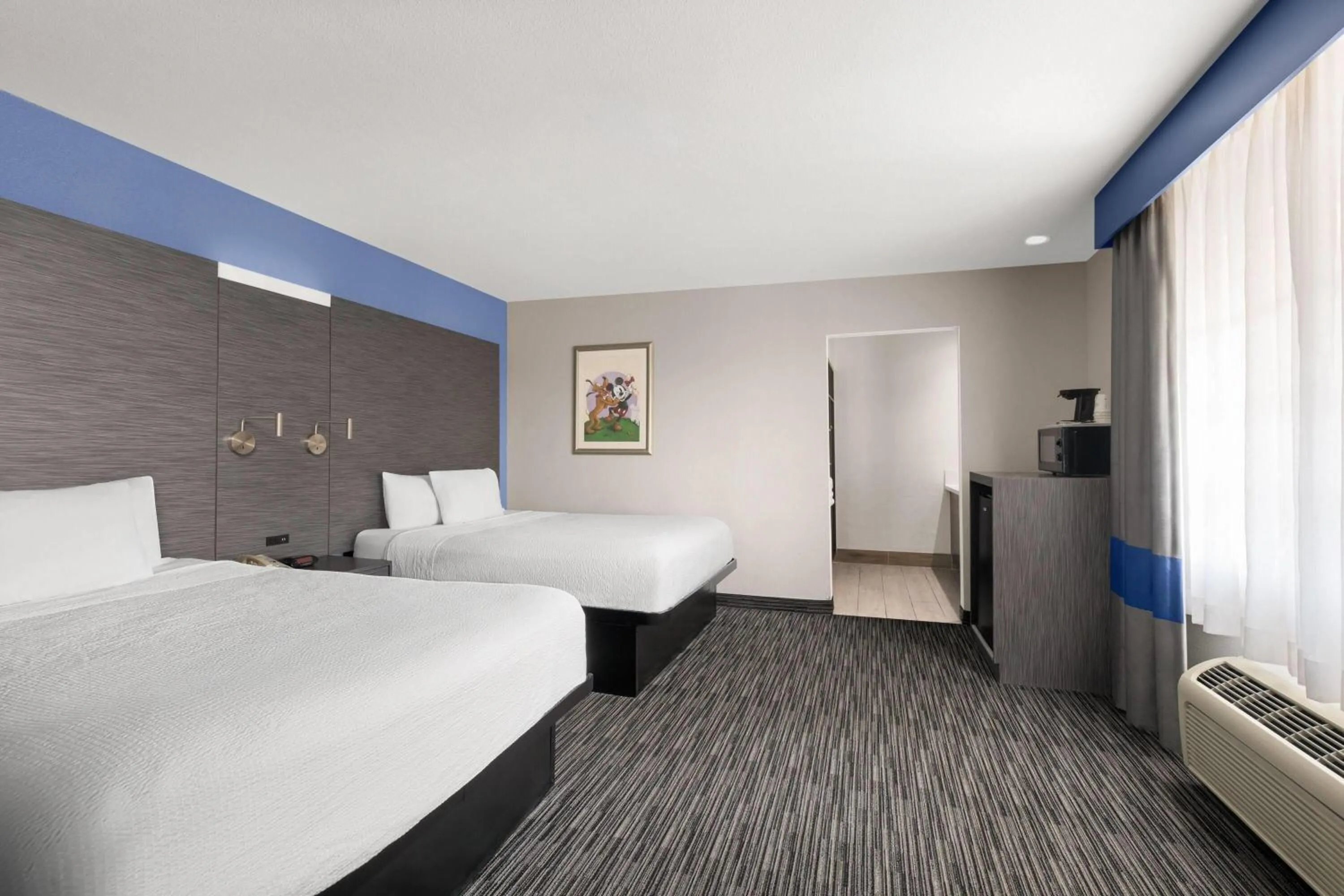 Photo of the whole room, Bed in Travelodge Inn & Suites by Wyndham Anaheim on Disneyland Dr