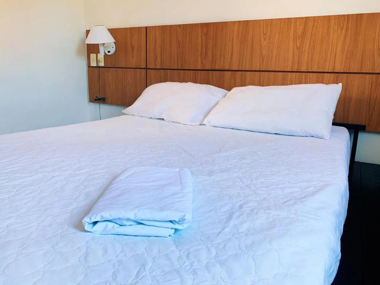 Bed in CONDOMÍNIO VILA DO MAR aptos 201C e 211B