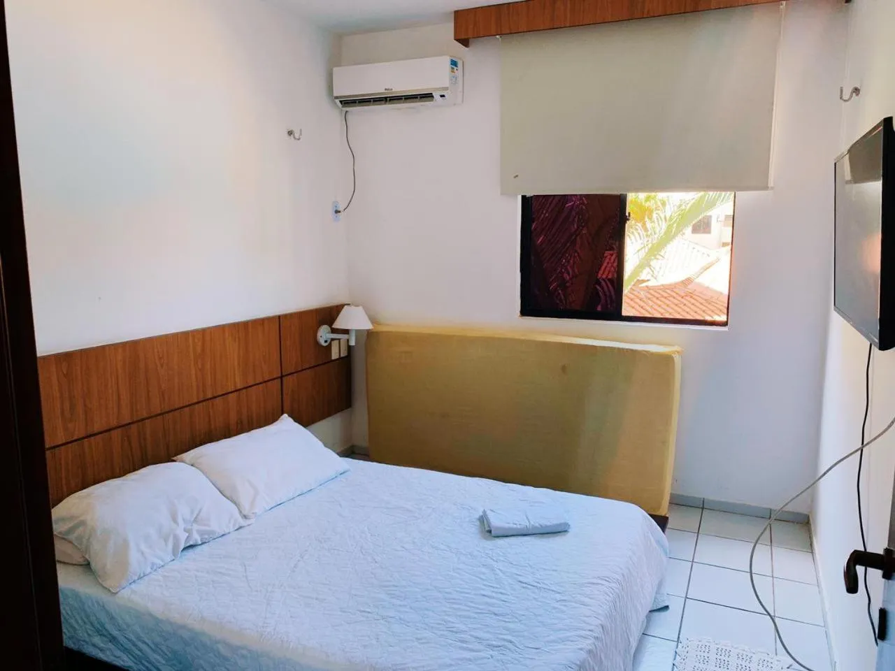 Bed in CONDOMÍNIO VILA DO MAR aptos 201C e 211B