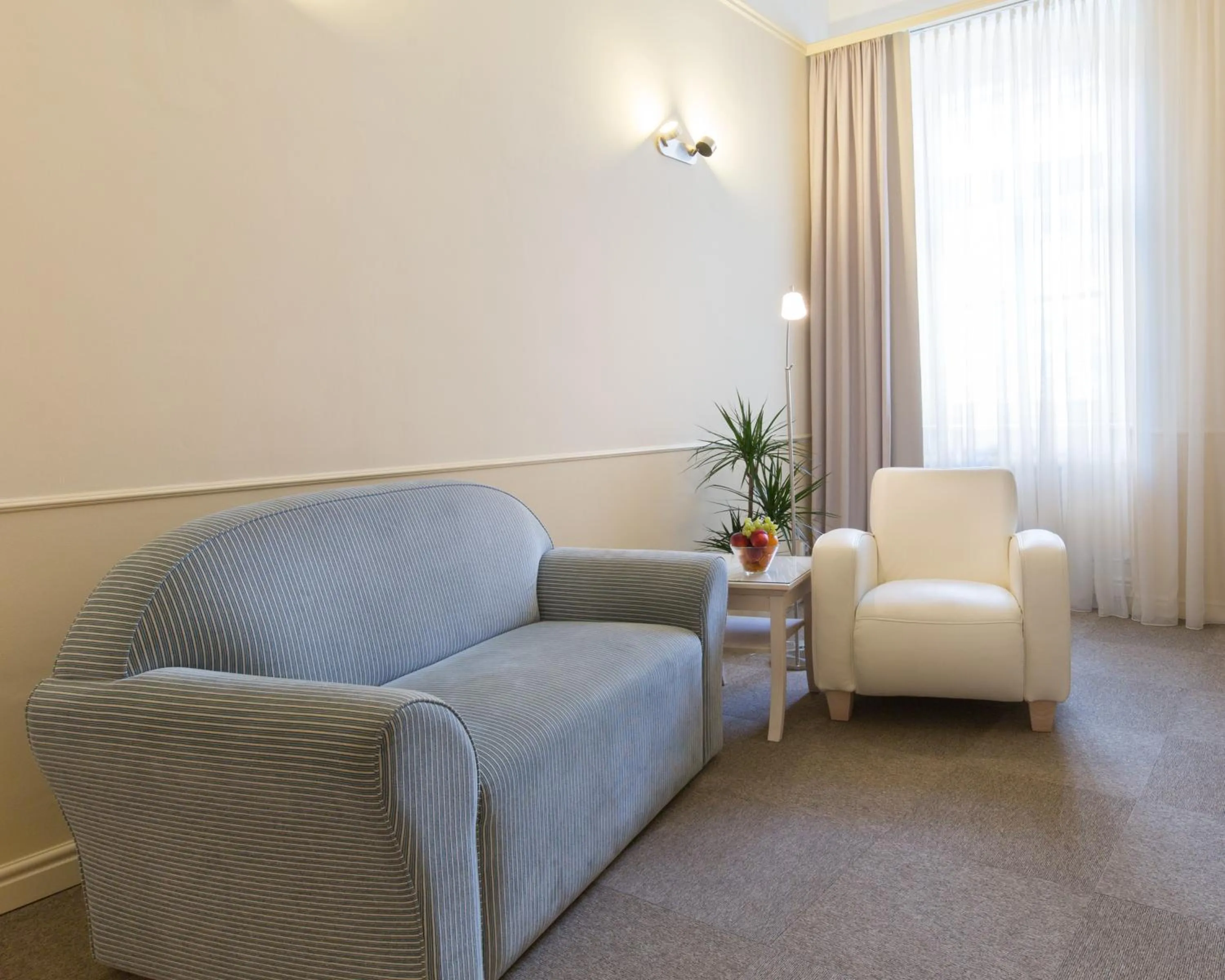 Living room in Unitas Hotel