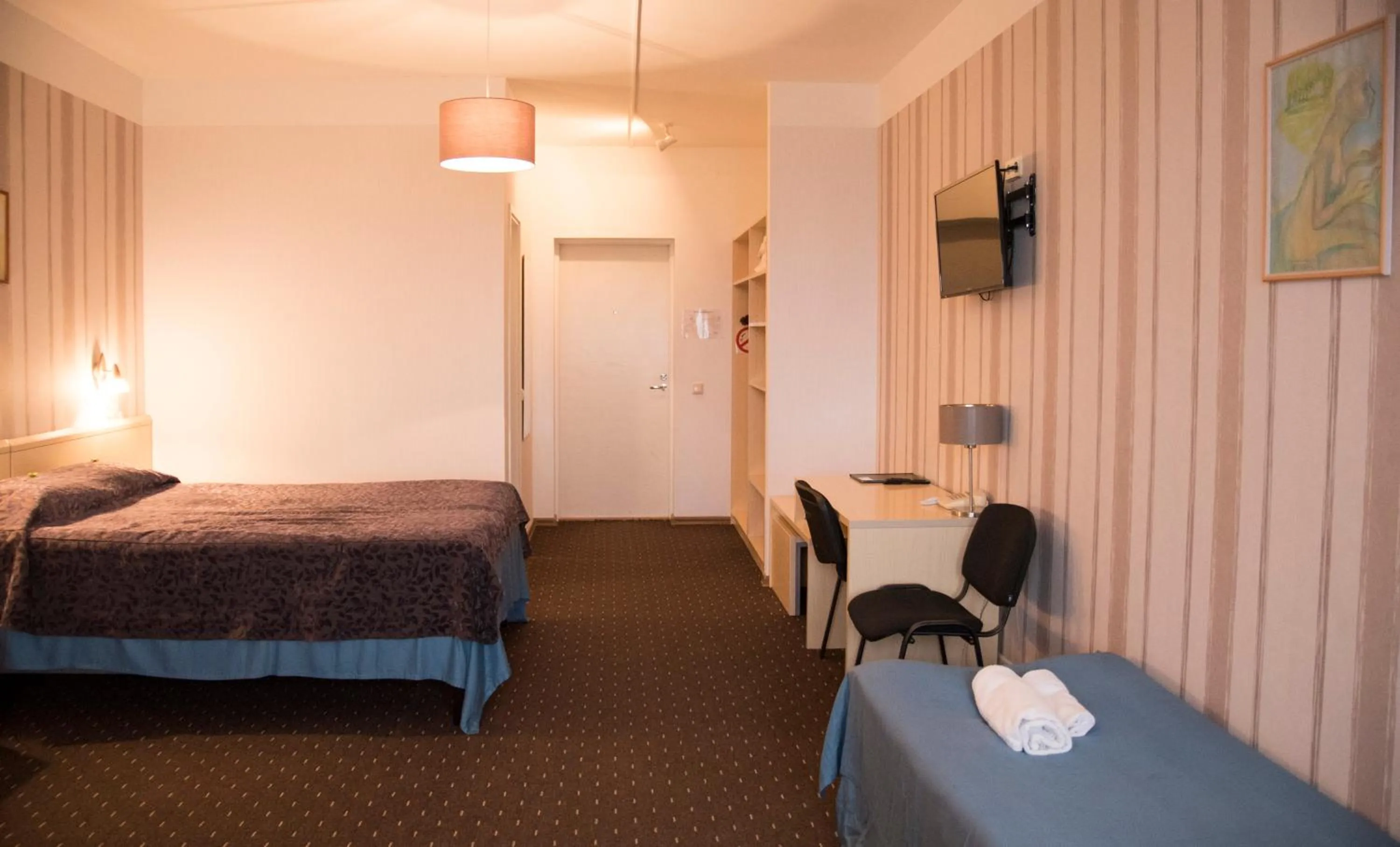 Living room, Bed in Hotell Tamula