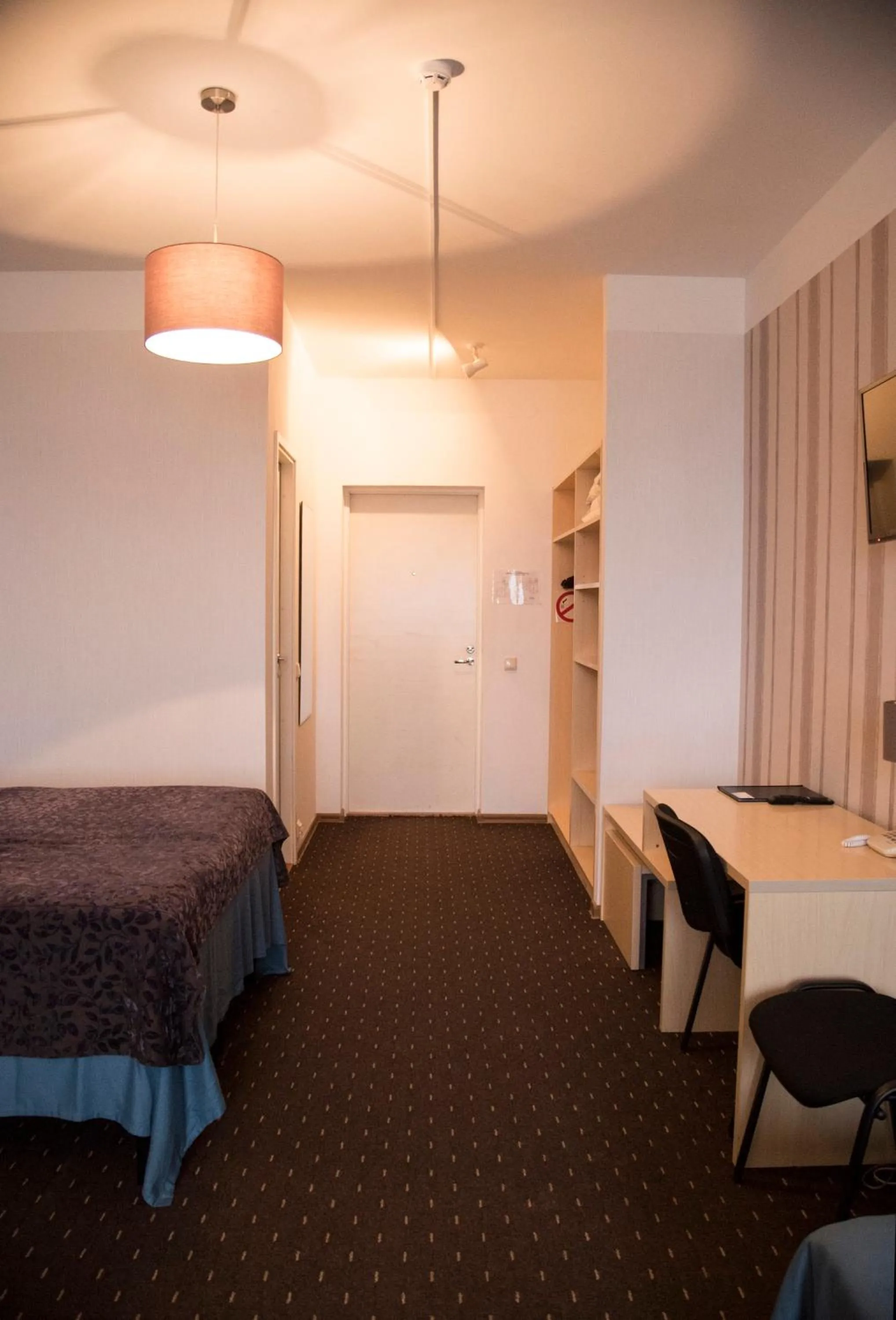 Living room, Bed in Hotell Tamula