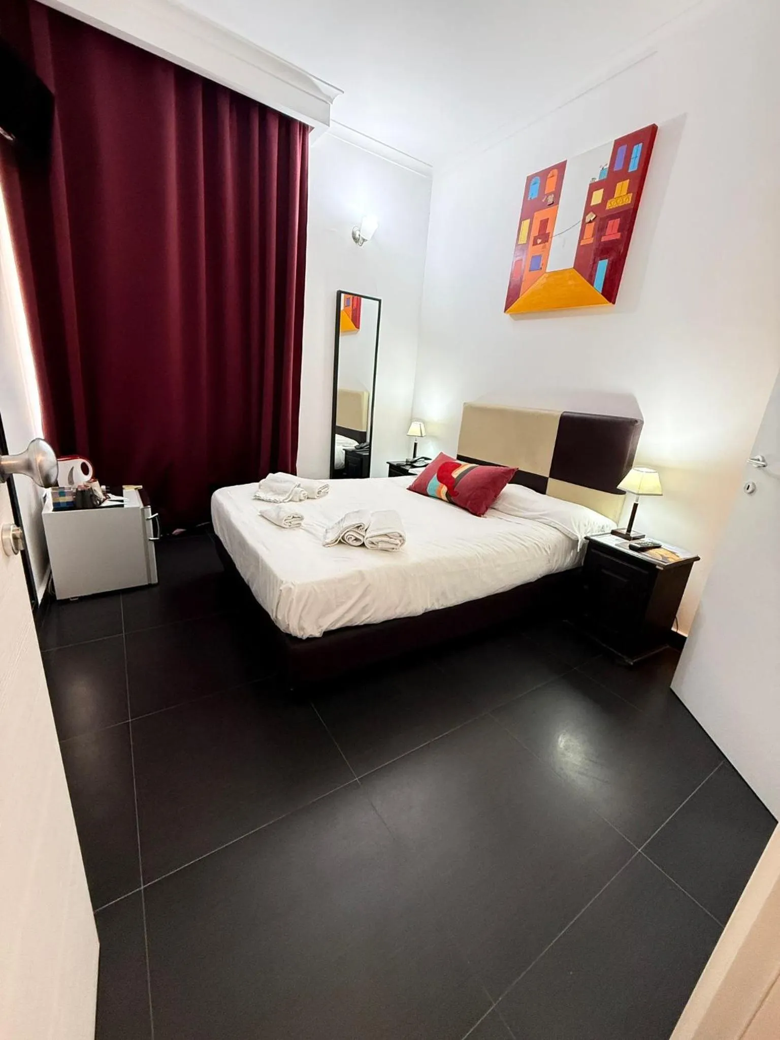 Bed in Hotel Plebiscito Aparthotel