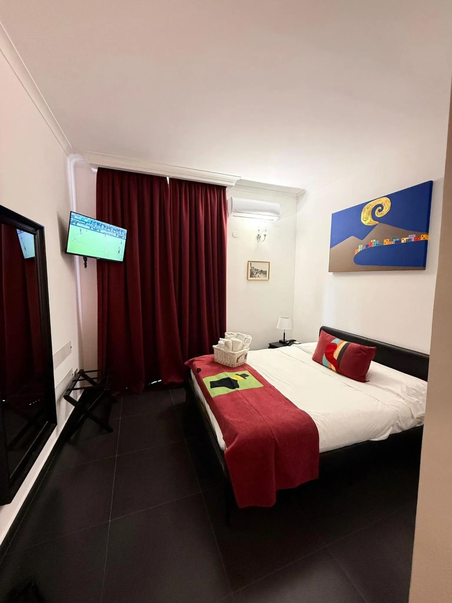 Bed in Hotel Plebiscito Aparthotel