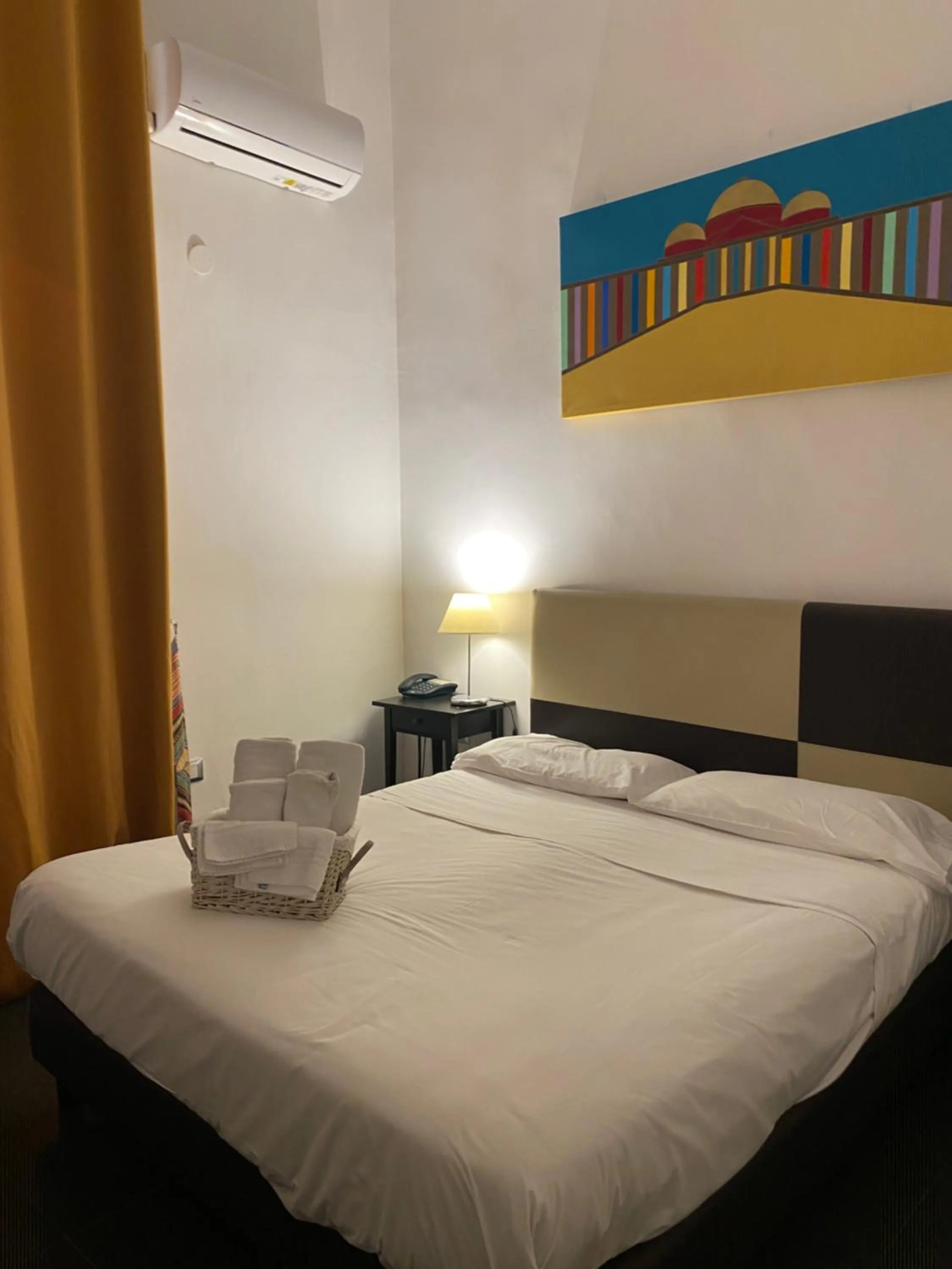 Bed in Hotel Plebiscito Aparthotel