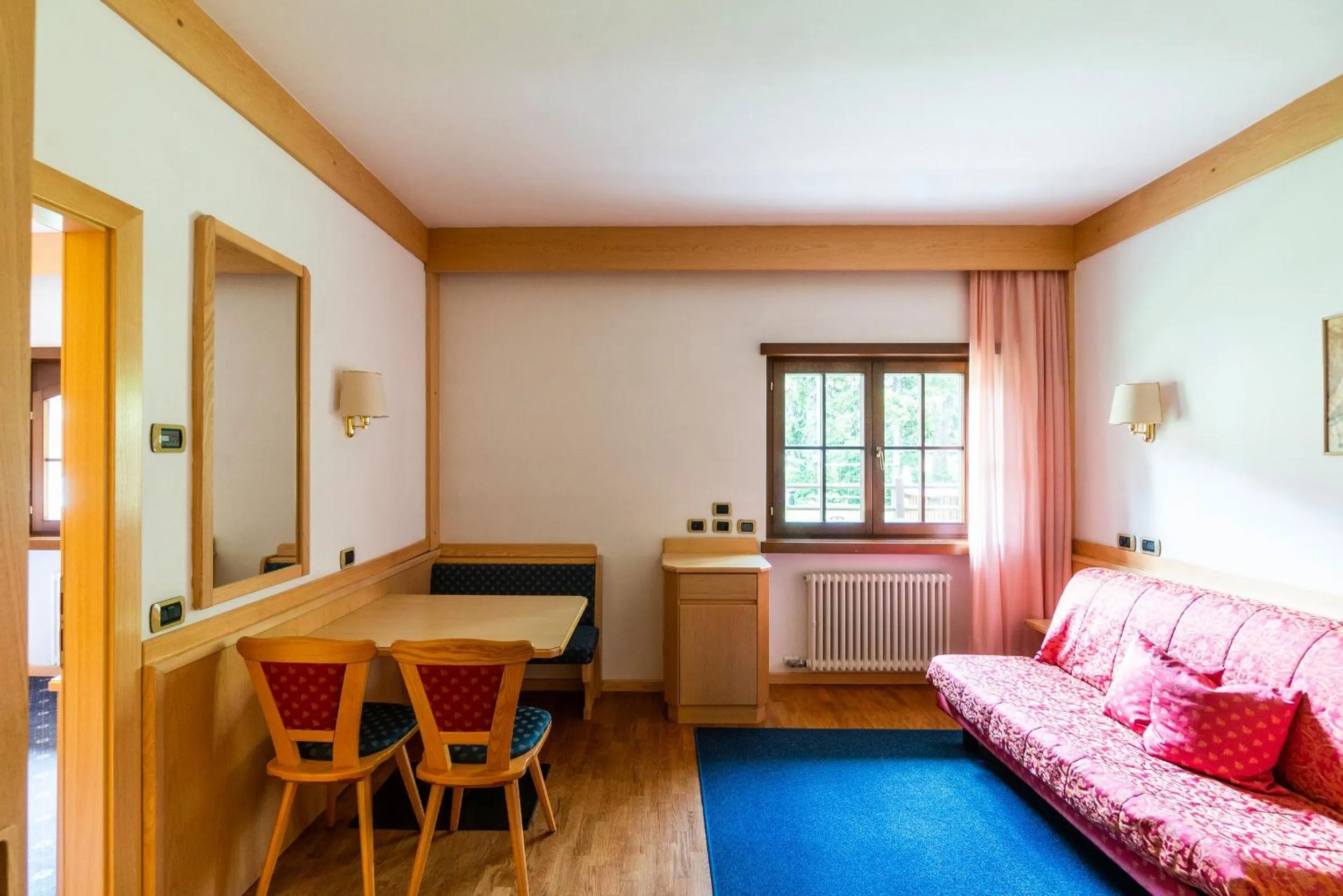 Seating area, Bed in Garni Aritz