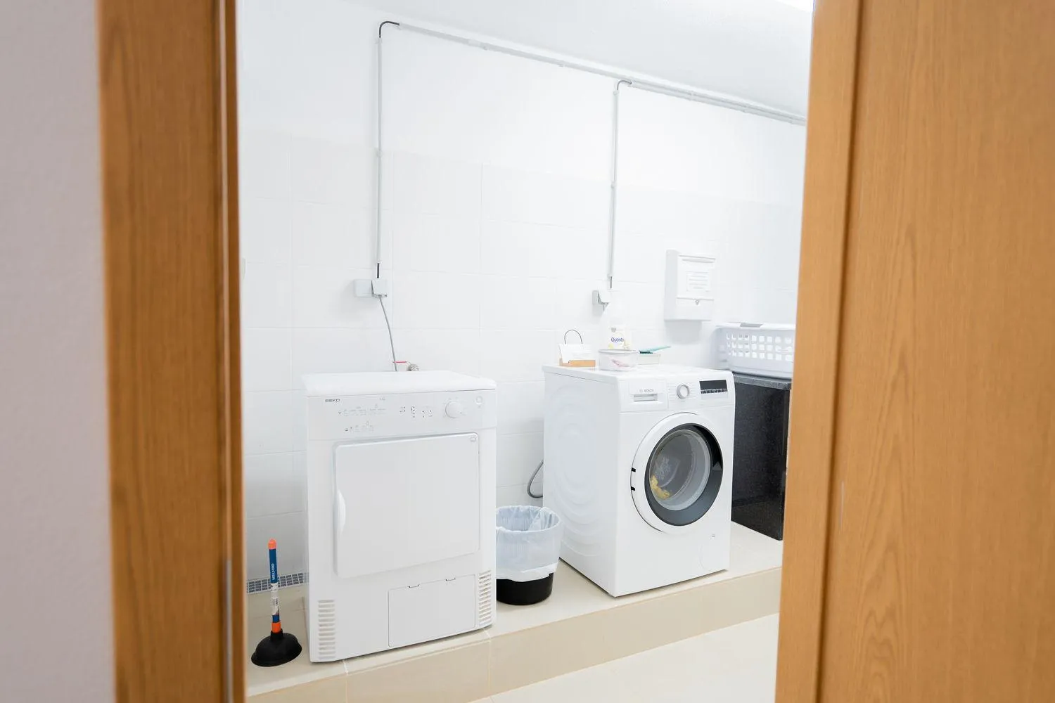 laundry in Luz Beach Apartments