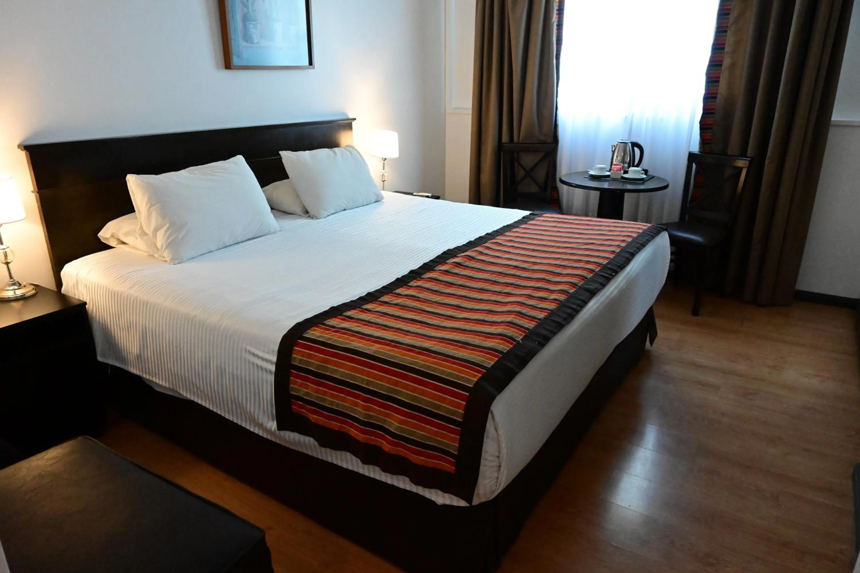 Bed in Hotel Mendoza