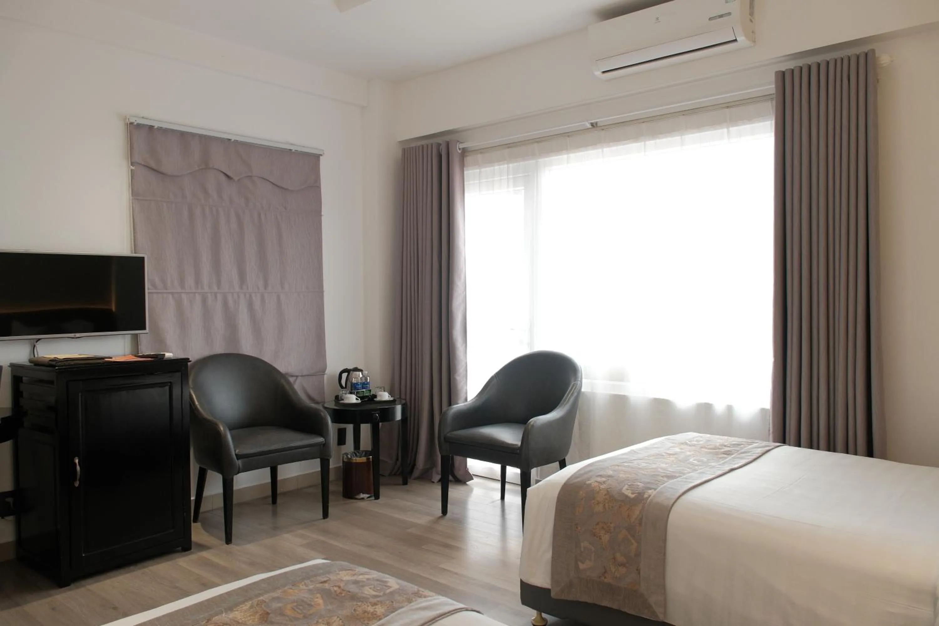 Bed in Rosaleen Boutique Hotel