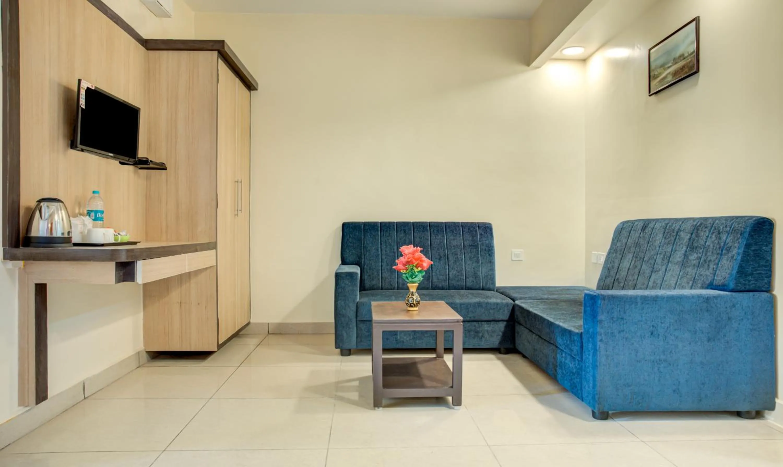 Seating area in Treebo Golden Inn, 700 Mtrs From Promenade Beach