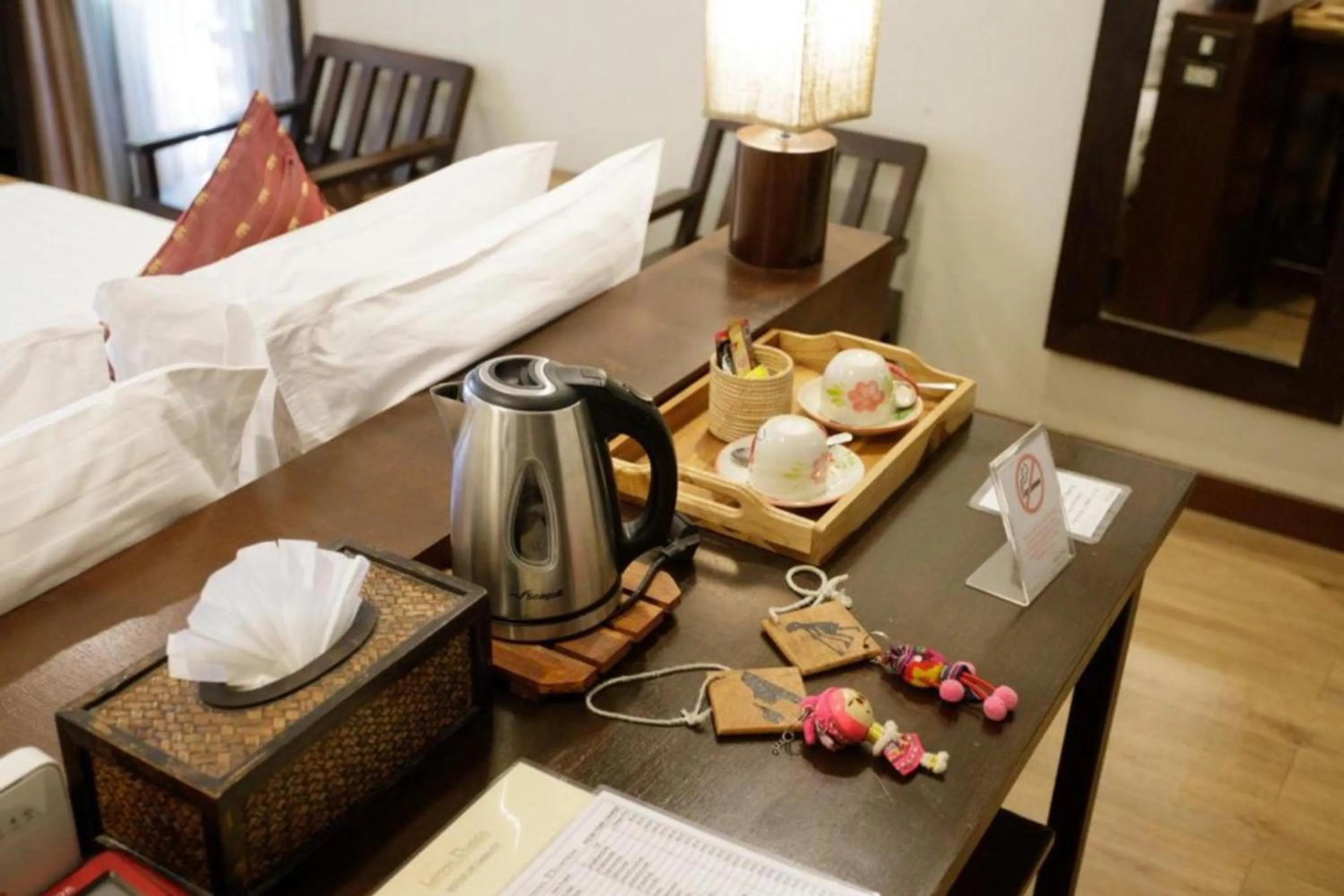 Photo of the whole room, Bed in Lanna Dusita Riverside Boutique Resort