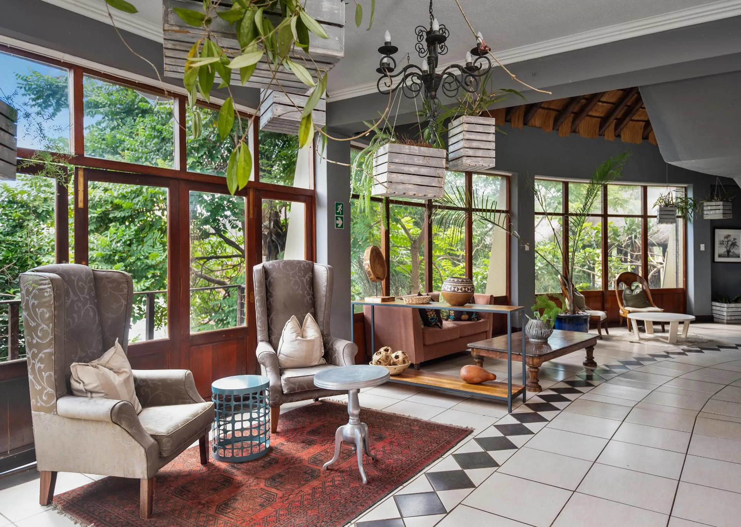 Communal lounge/ TV room in Jozini Tiger Lodge & Spa by Dream Resorts