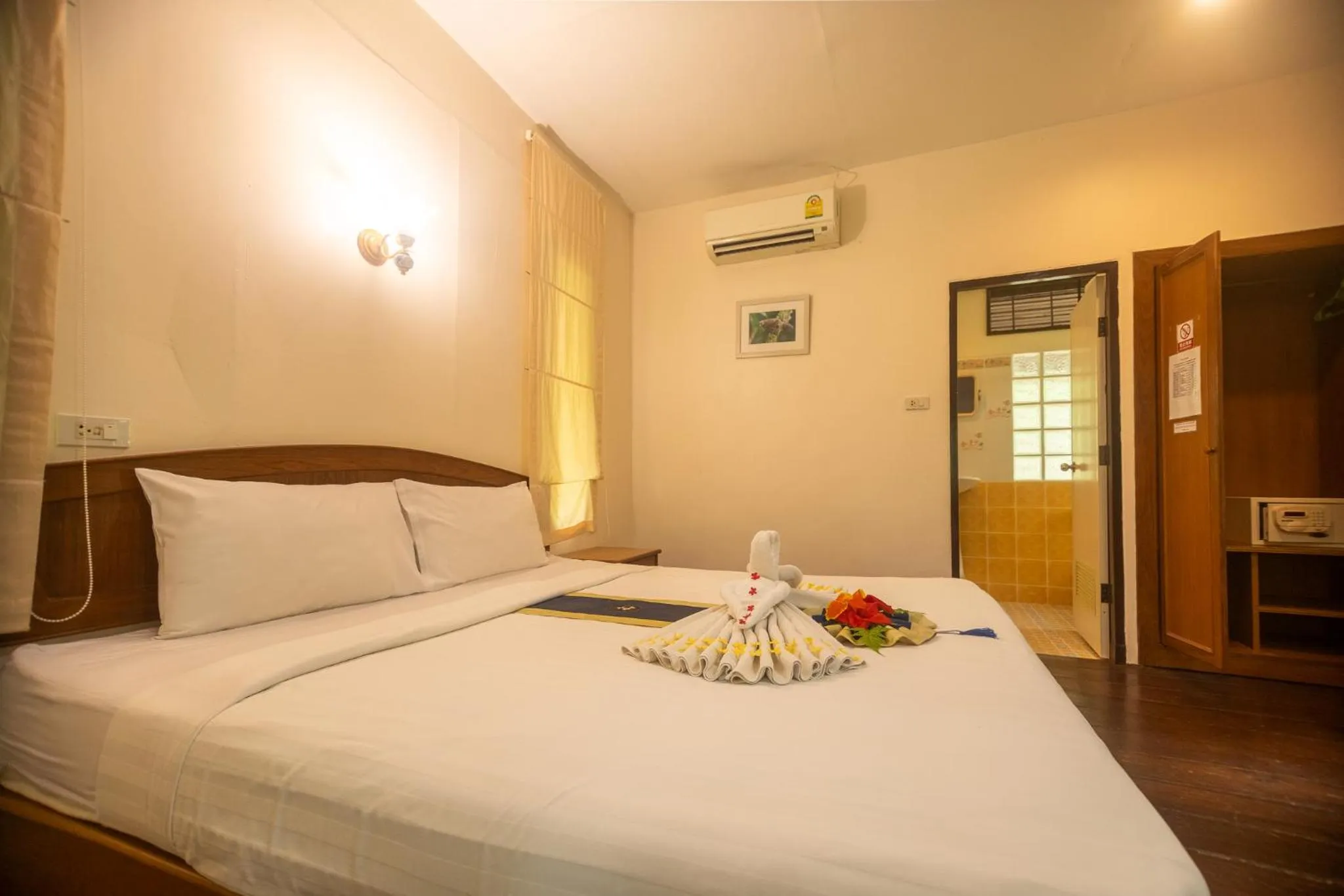 Bed in The Vatika Resort and Spa