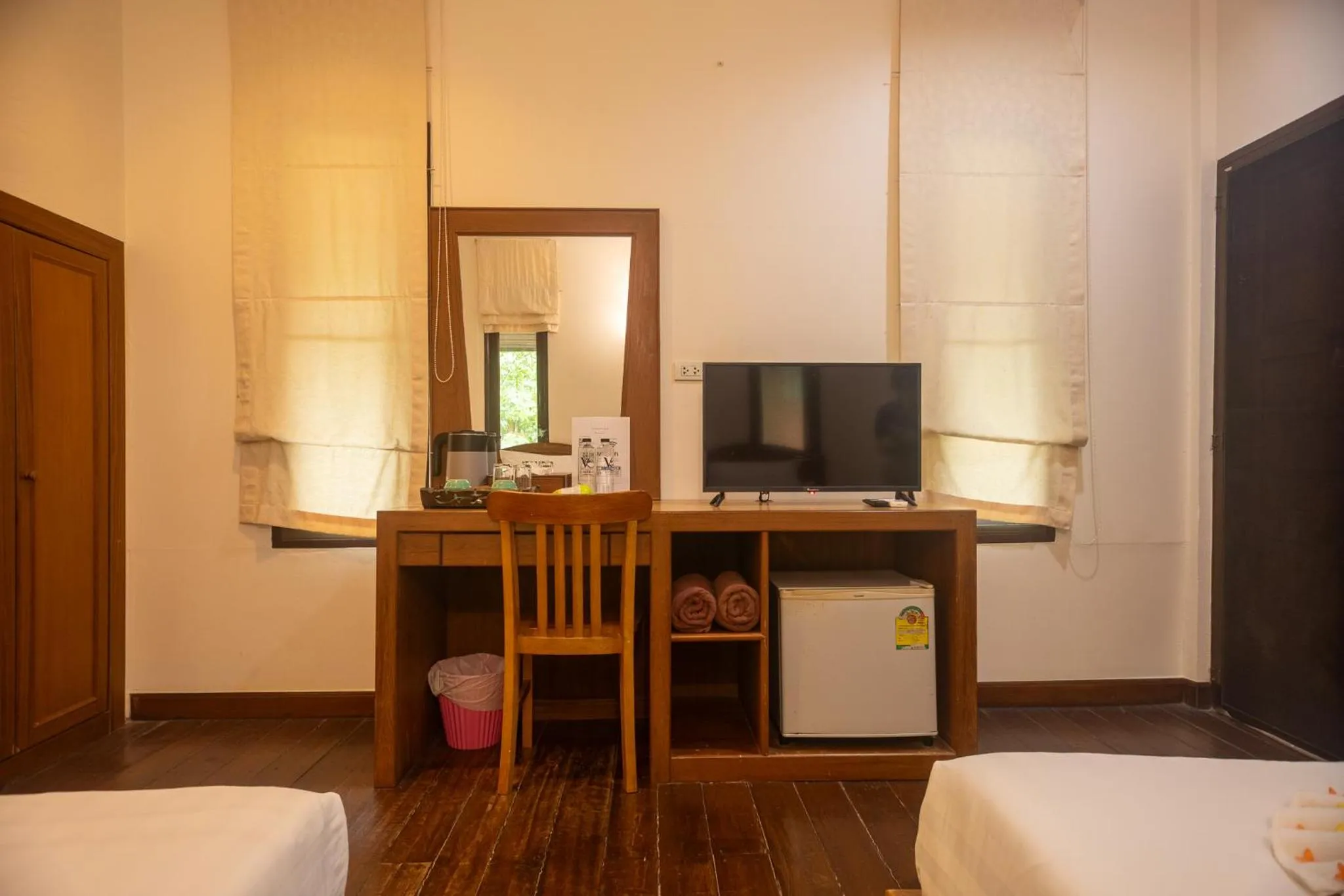 Bed in The Vatika Resort and Spa