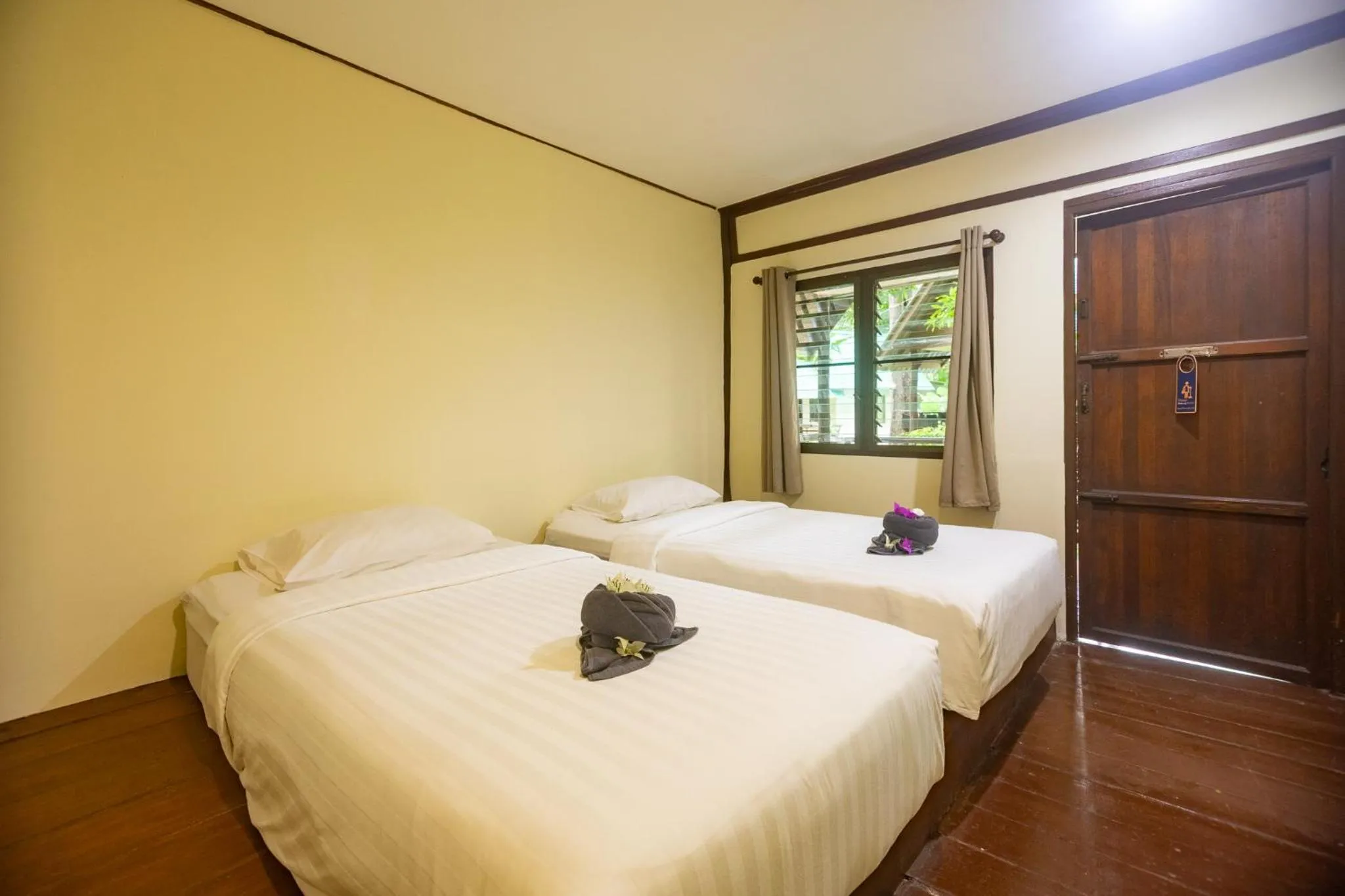 Bed in The Vatika Resort and Spa
