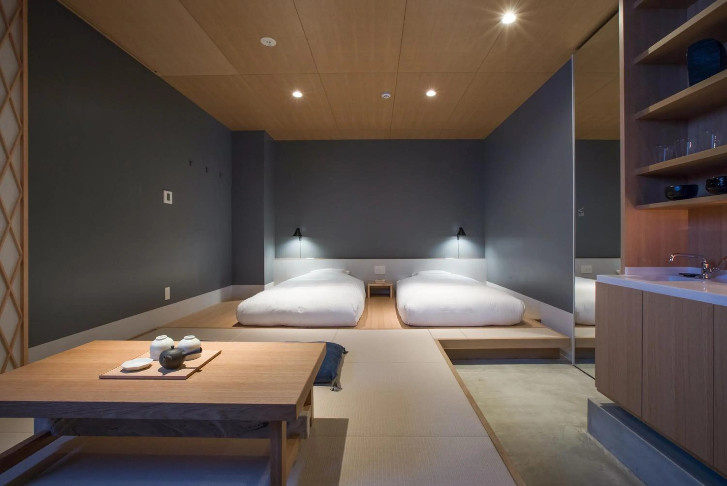 Bed in KUMU Kanazawa by THE SHARE HOTELS