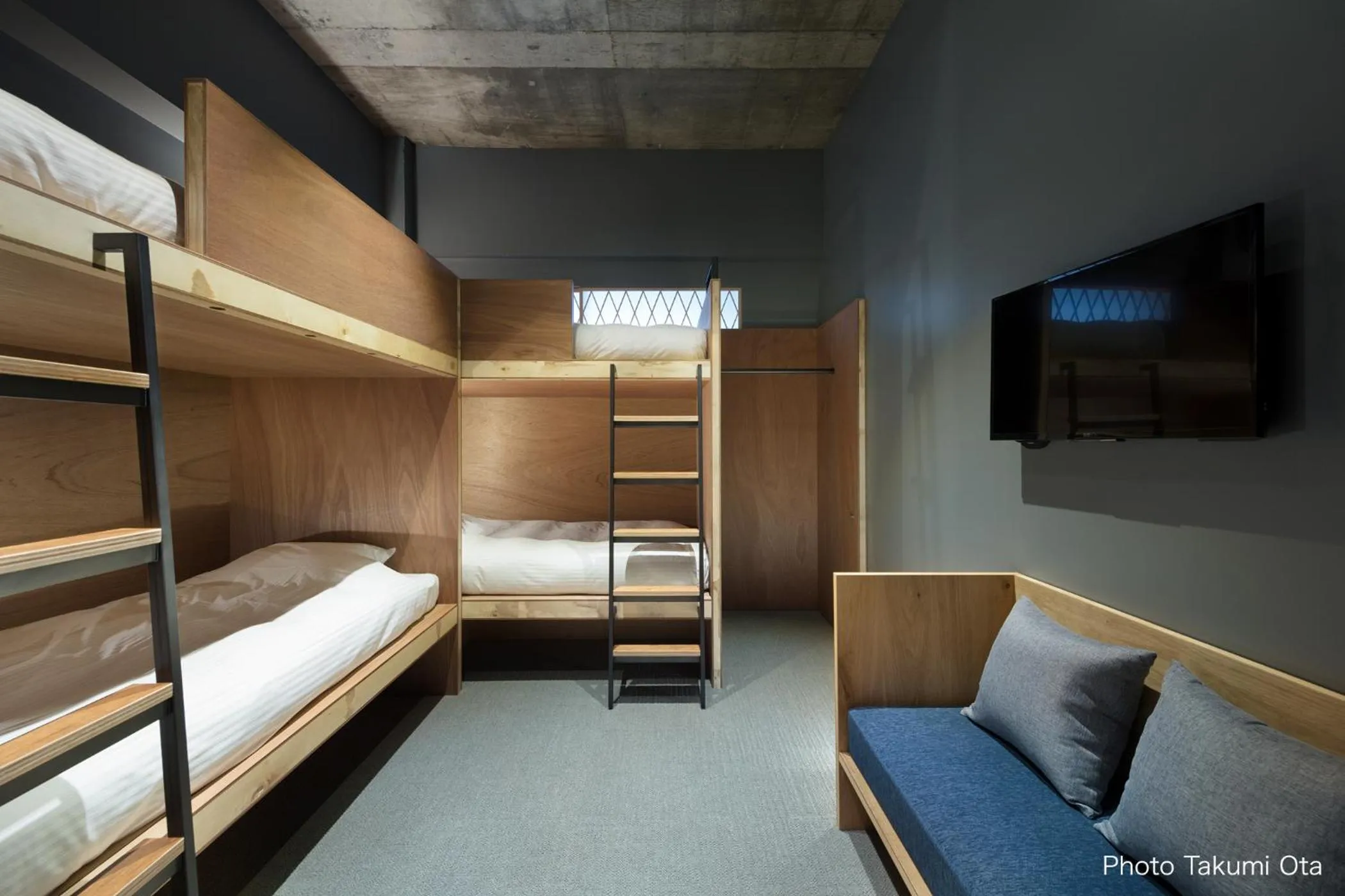 Bed in KUMU Kanazawa by THE SHARE HOTELS