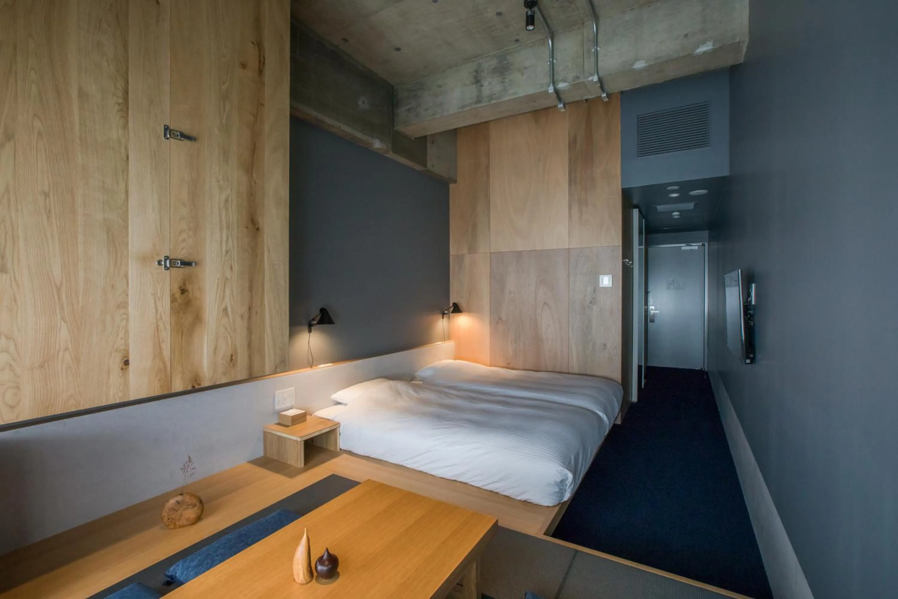 Photo of the whole room, Bed in KUMU Kanazawa by THE SHARE HOTELS