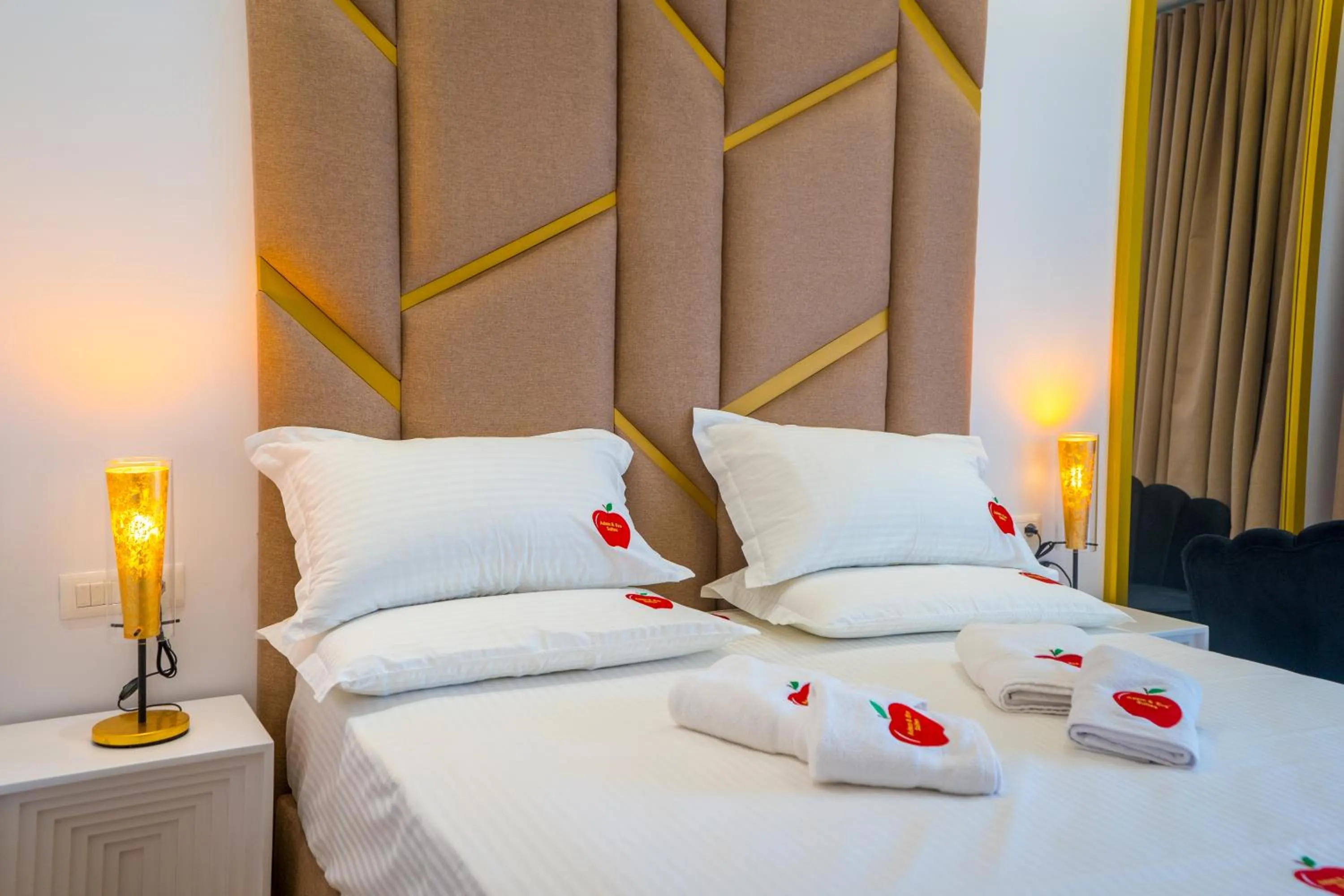 Bed in Adam & Eve Suites