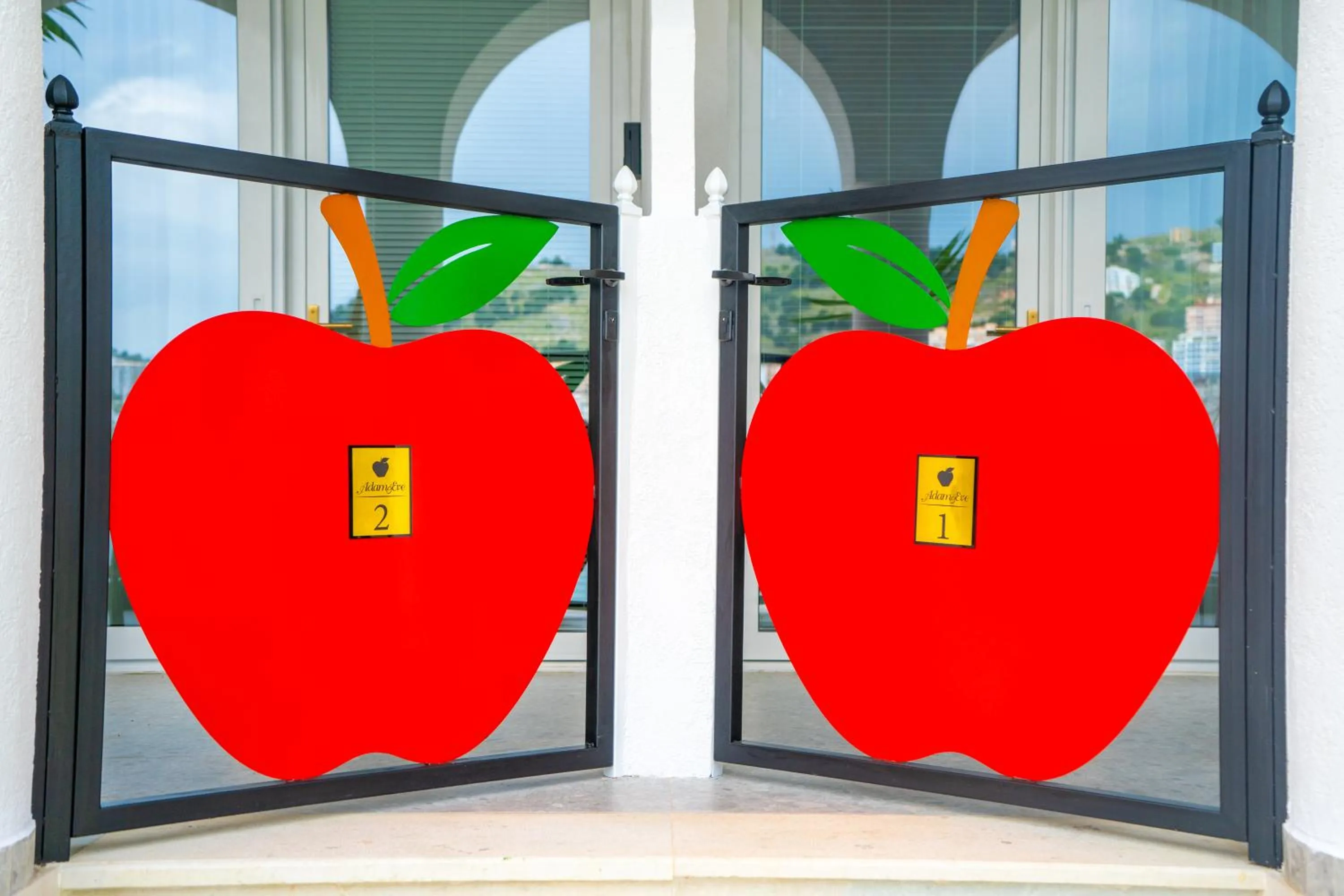 Property logo or sign in Adam & Eve Suites