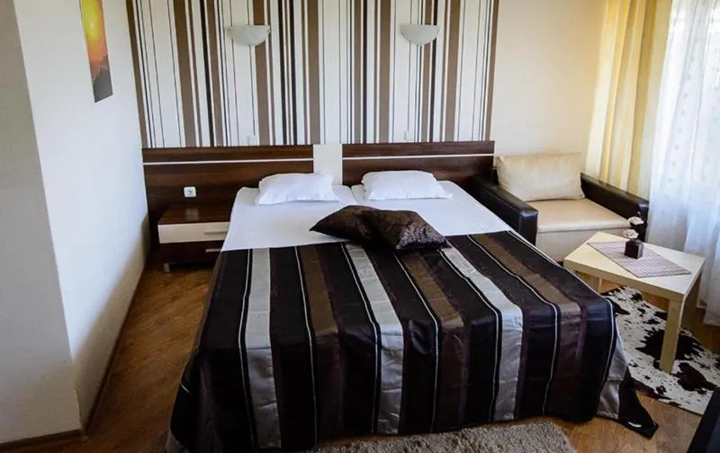 Bed in Sunrise Hotel