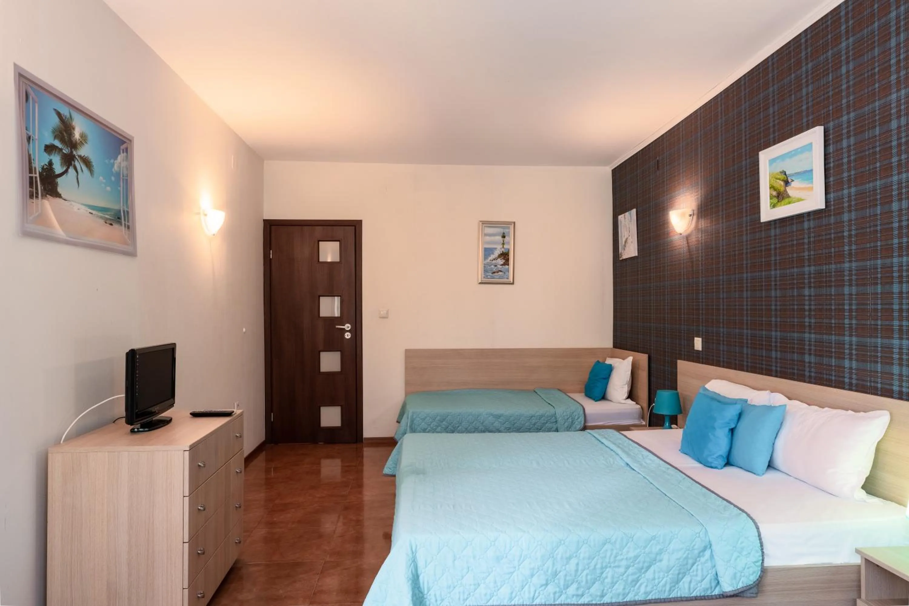 Bed in Sunrise Hotel