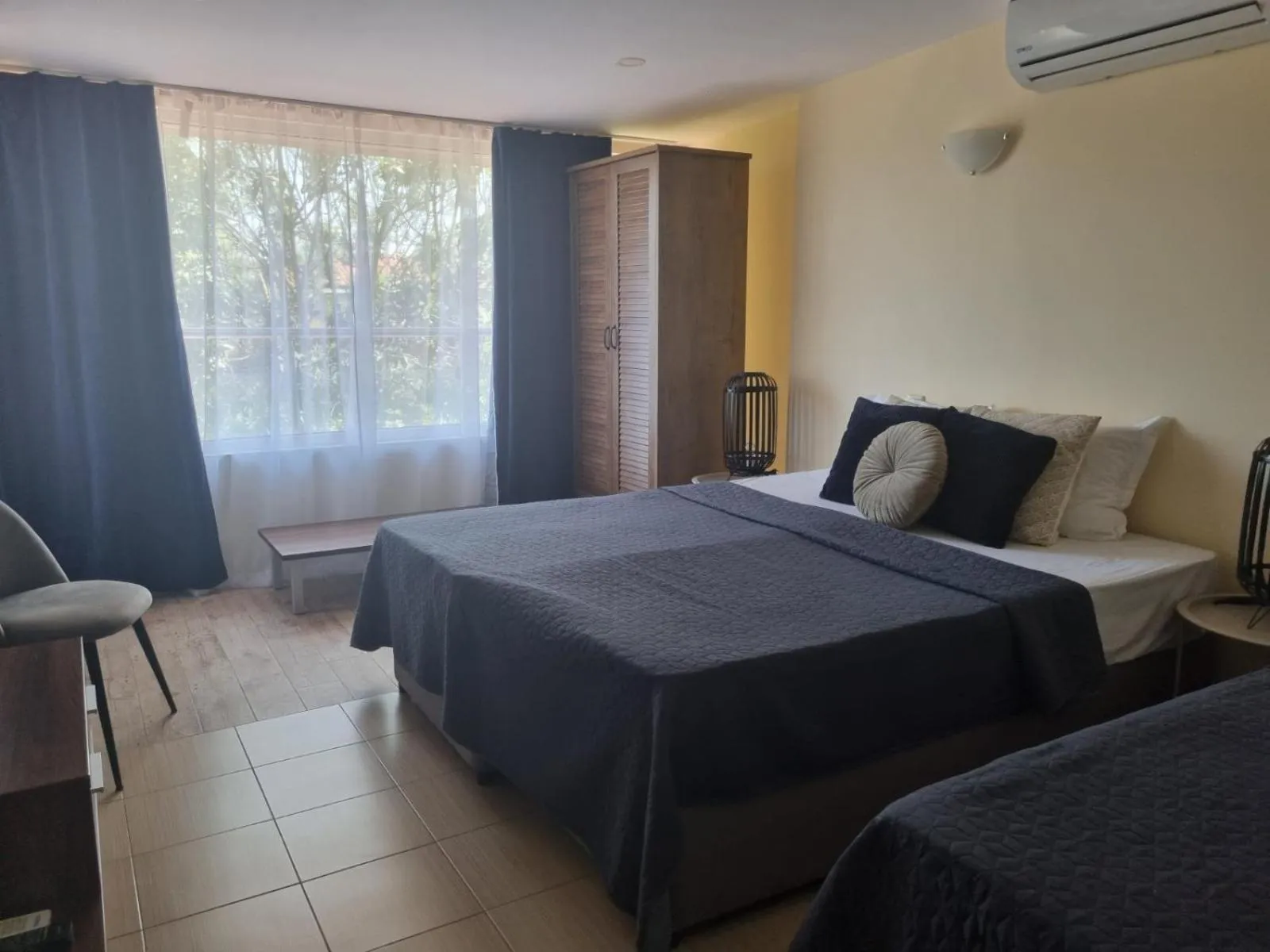 Bed in Sunrise Hotel