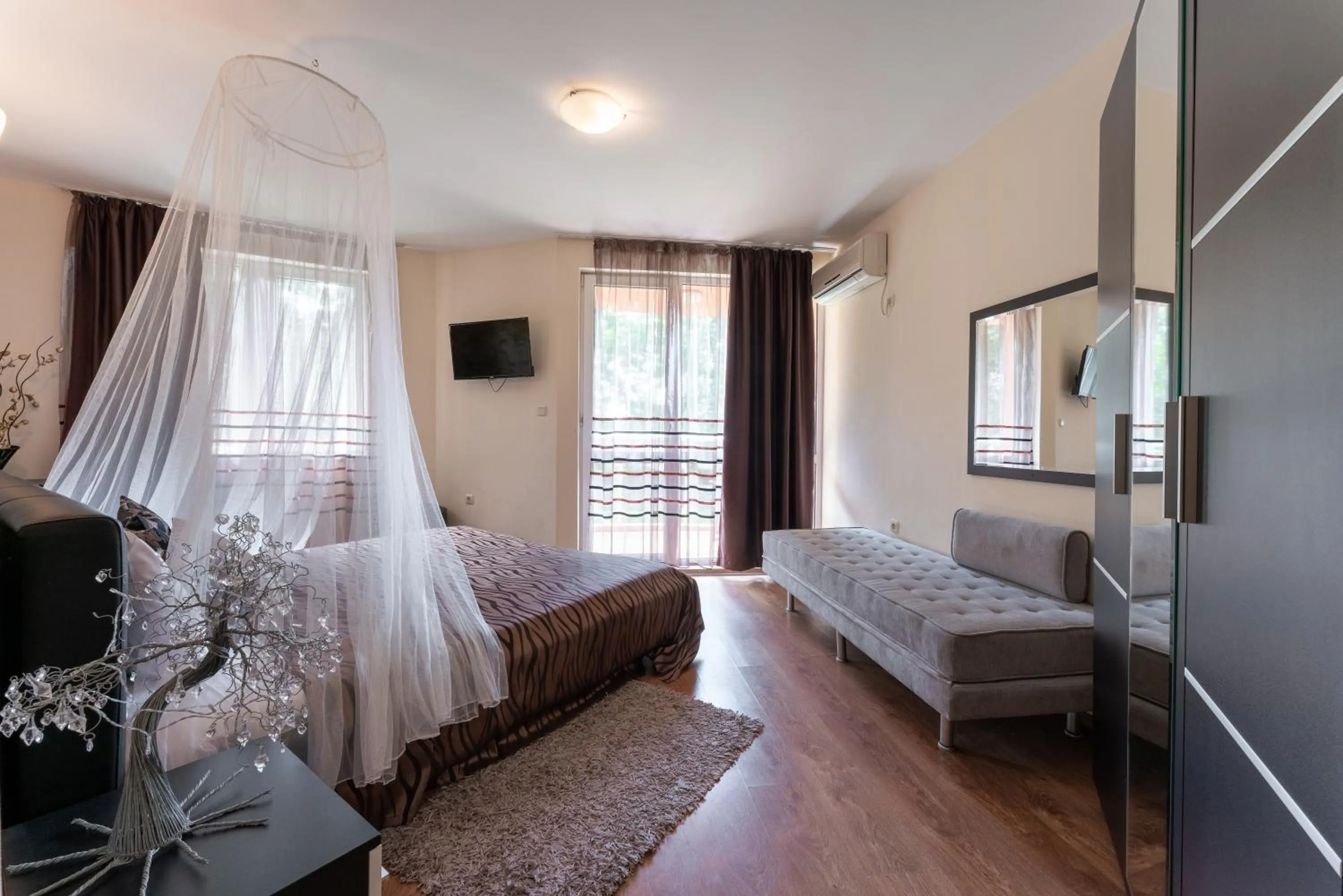 Bed in Sunrise Hotel