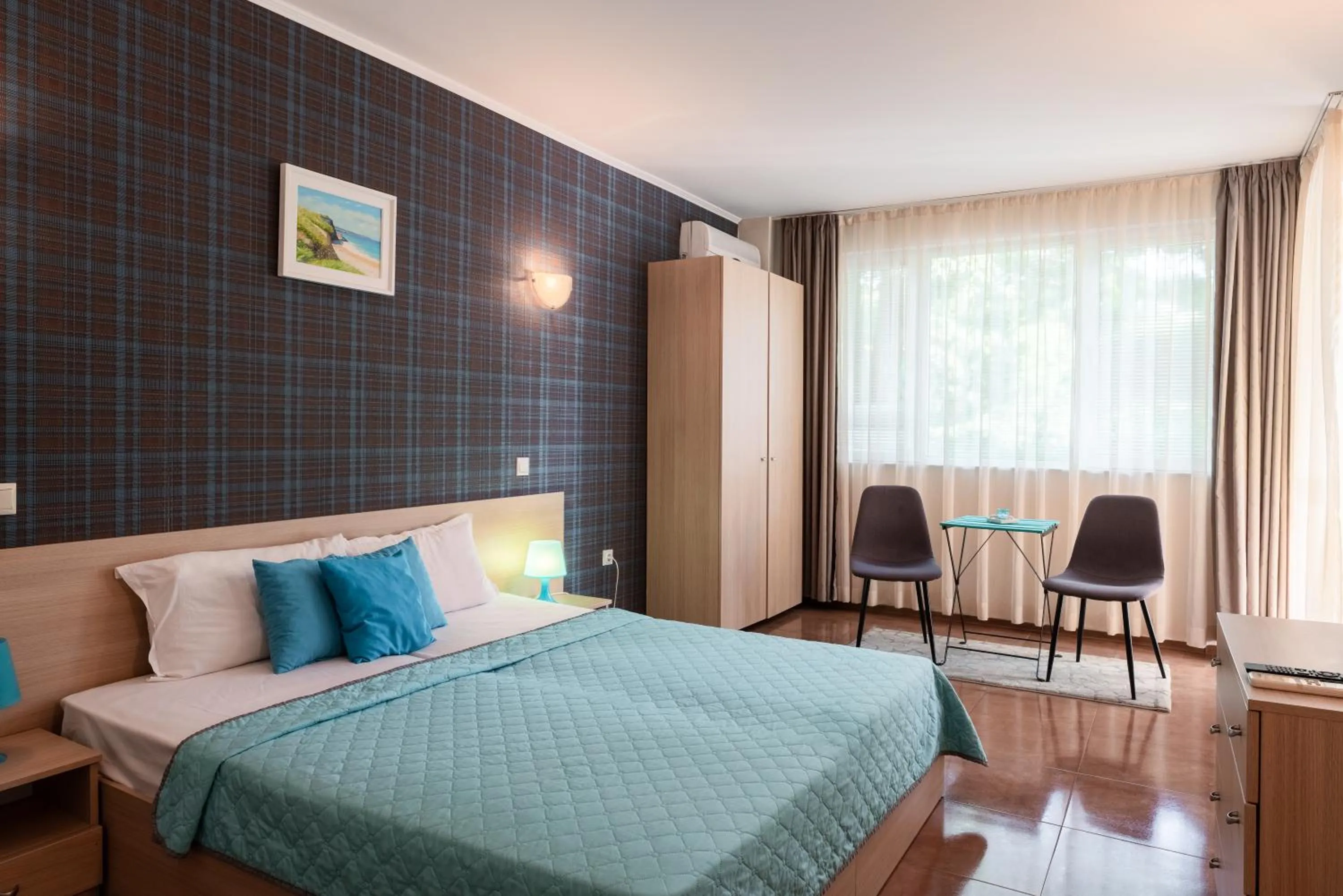 Bed in Sunrise Hotel